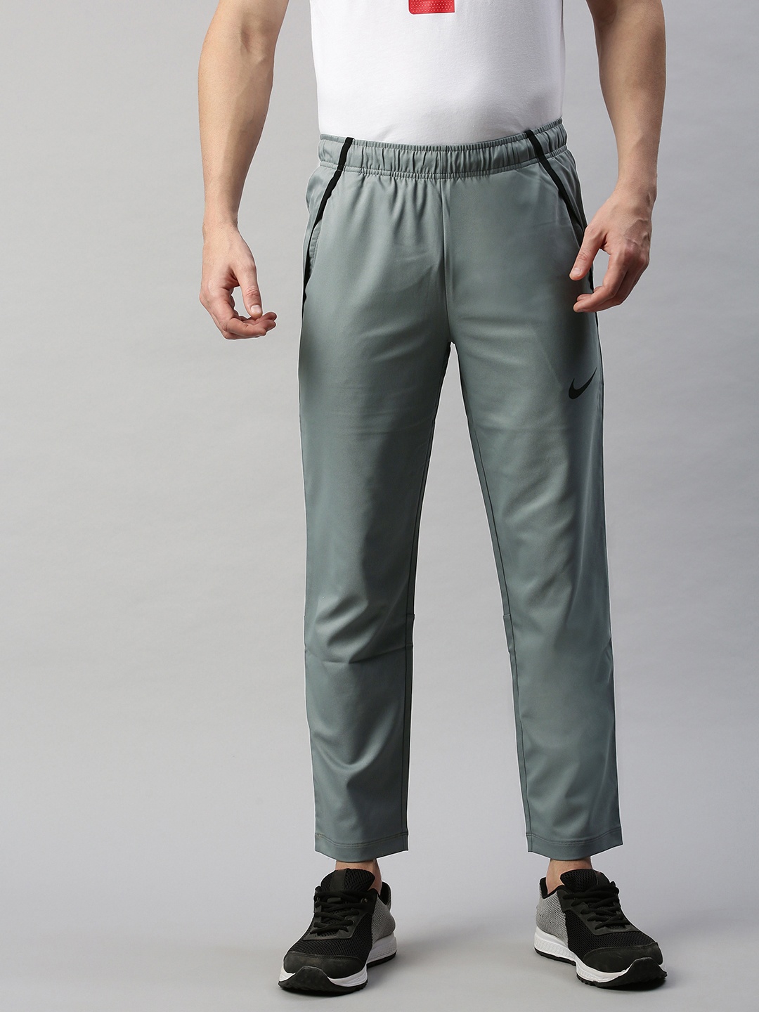 

Nike Men's Grey Solid NK Dry Pant Team Woven Track Pants