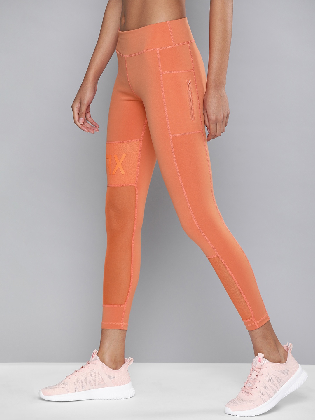 

HRX By Hrithik Roshan Women Soap Nut Solid Skinny Fit Rapid-Dry Antimicrobial Running Tights, Orange