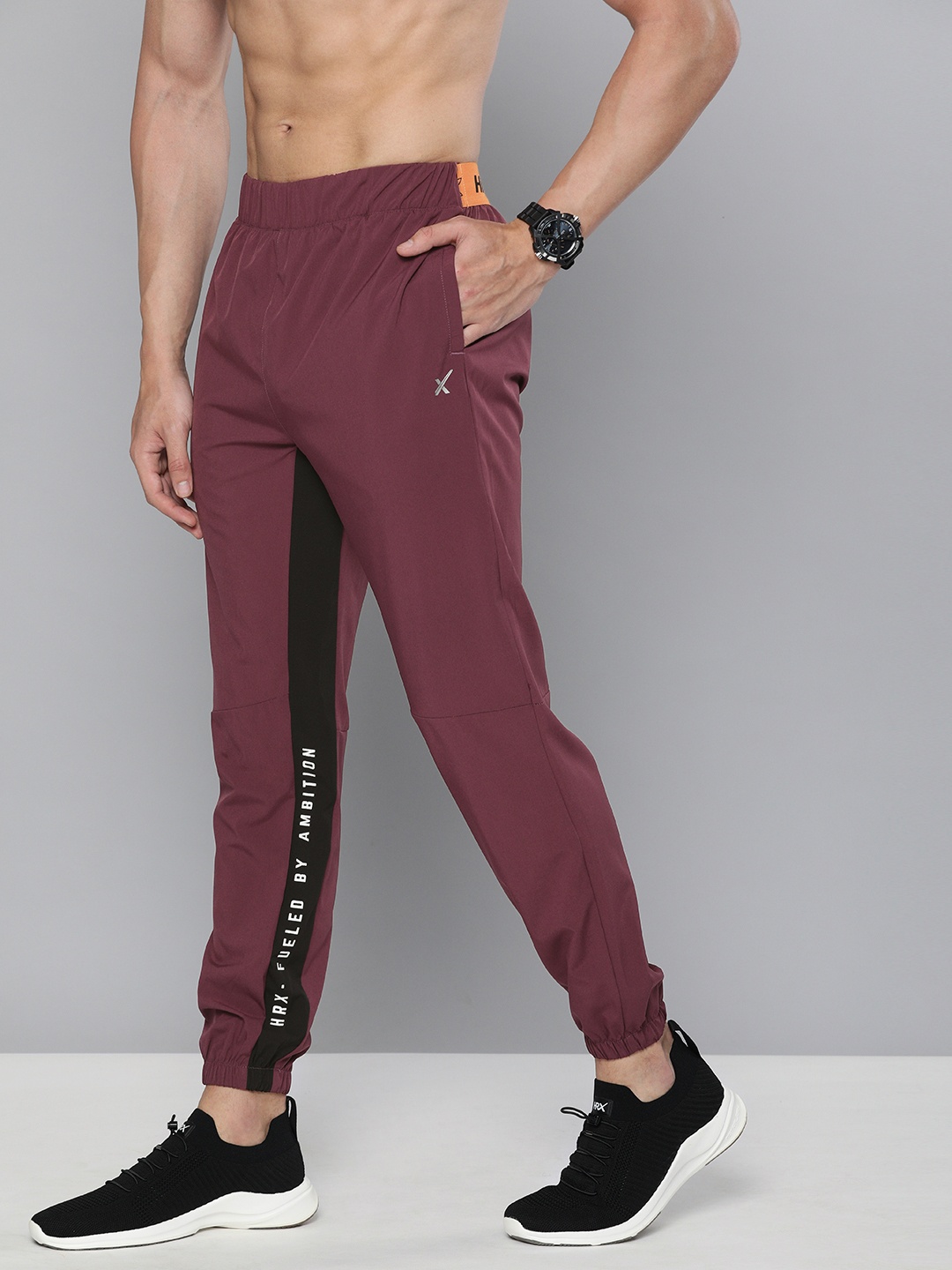 

HRX By Hrithik Roshan Men Jet Black & Zinfadel Typographic Slim Fit Rapid-Dry Antimicrobial Training Joggers, Burgundy