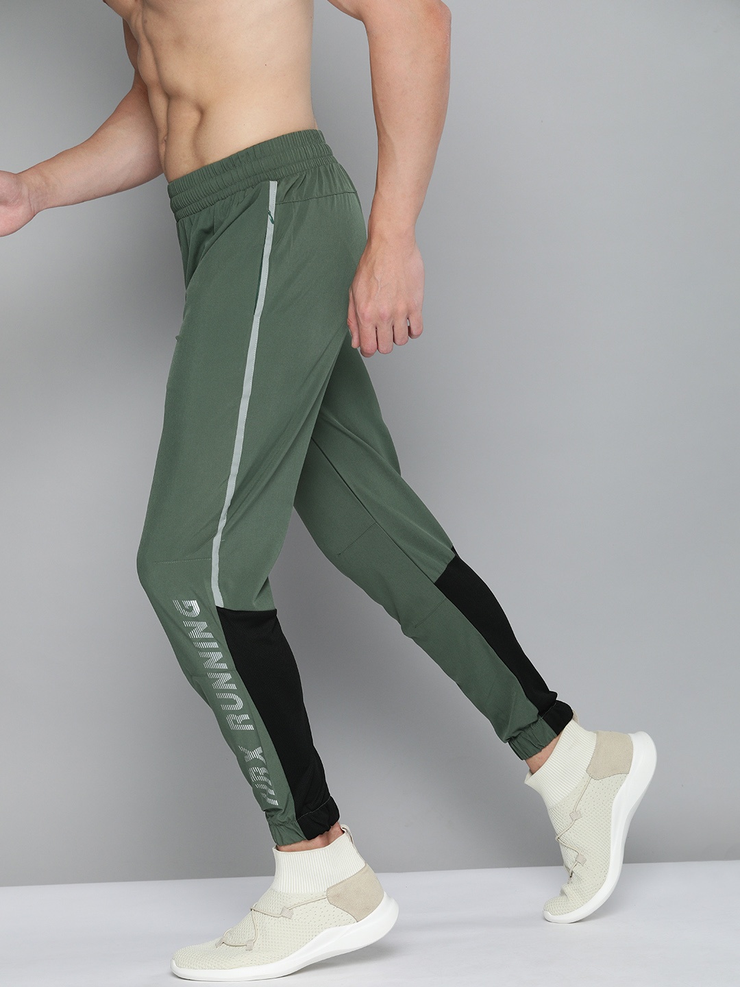 

HRX By Hrithik Roshan Men Black Forest &Jet Black Colourblock Slim Fit Rapid-Dry Antimicrobial Running Track Pants, Green
