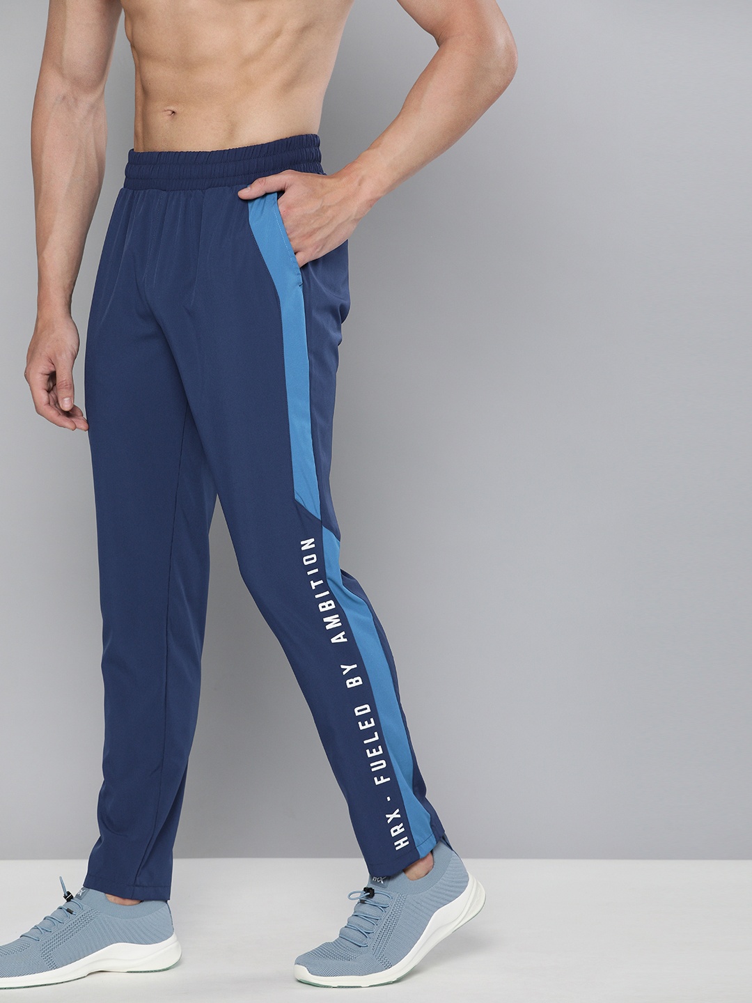 

HRX By Hrithik Roshan Men Mazarine & Estate Blue Colourblock Slim Fit Rapid-Dry Antimicrobial Training Track Pants