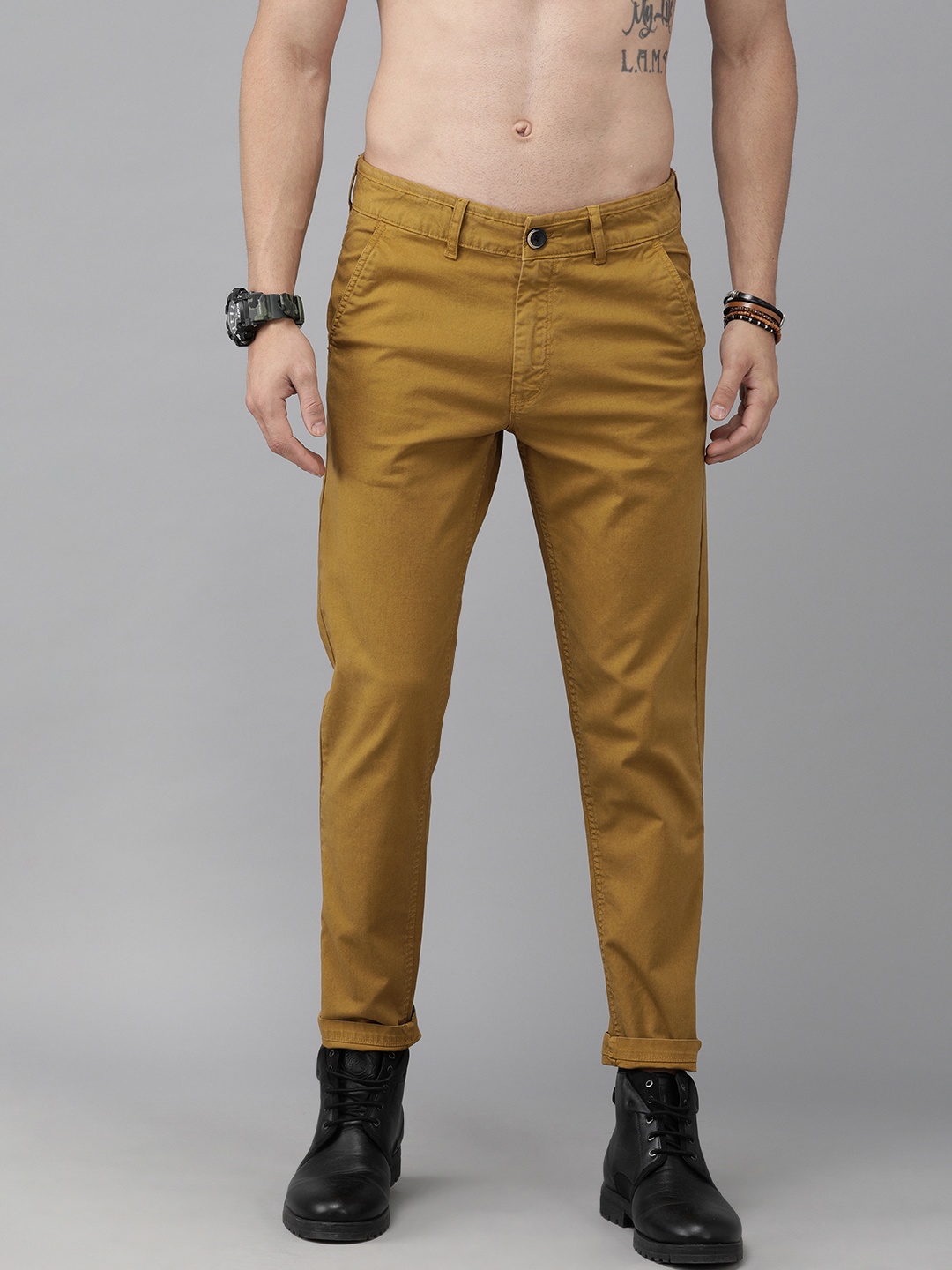 

Roadster Men Brown Tapered Fit Solid Regular Trousers