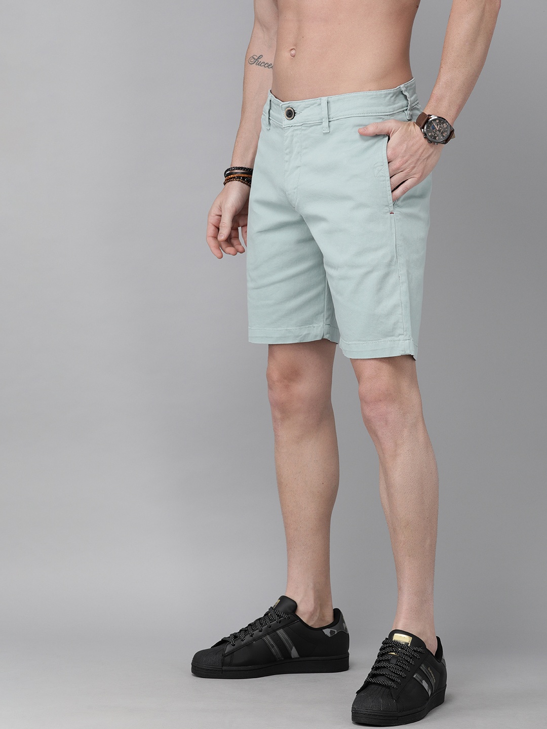 

Roadster Men Blue Solid Regular Fit Chino Shorts