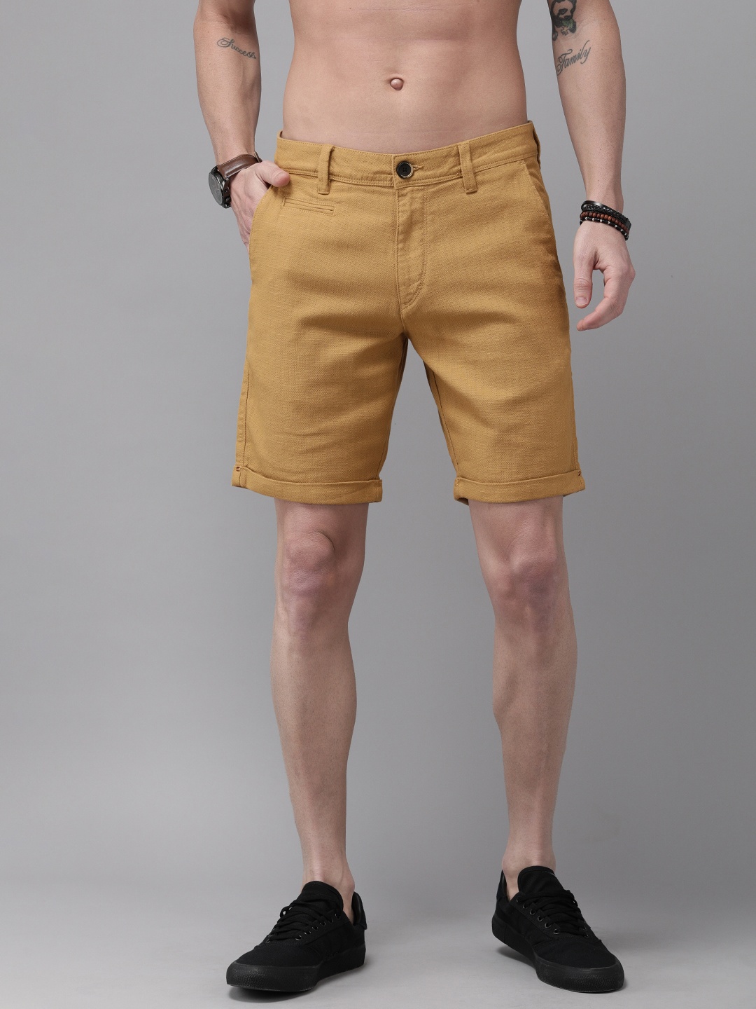 

Roadster Men Khaki Self Design Regular Fit Regular Shorts