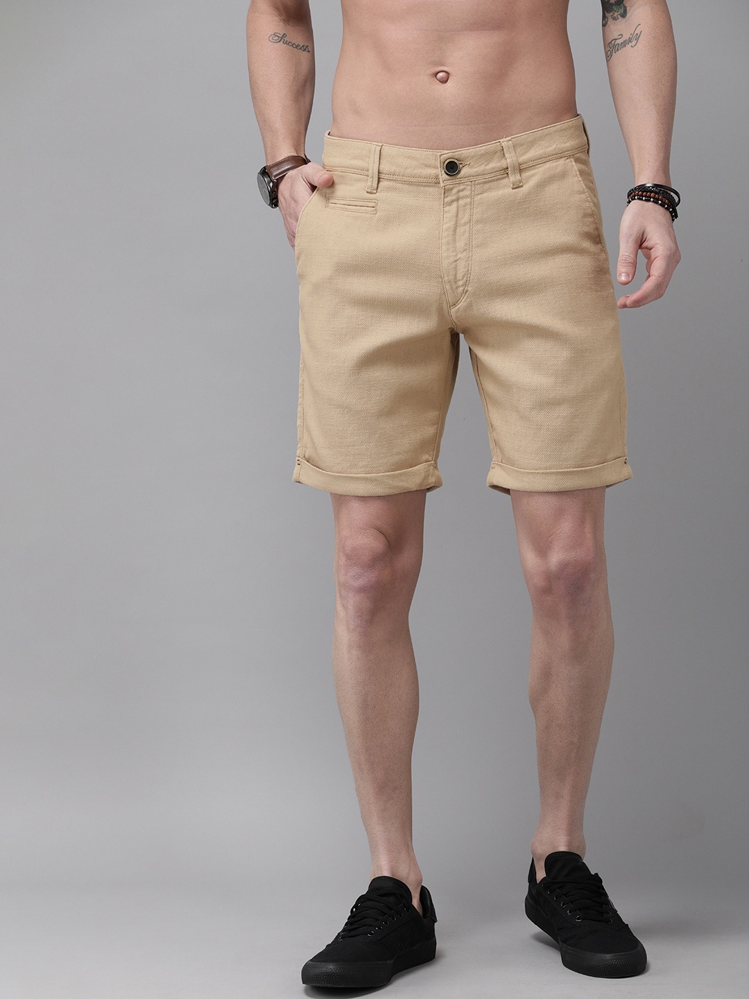 

Roadster Men Beige Self Design Regular Fit Regular Shorts