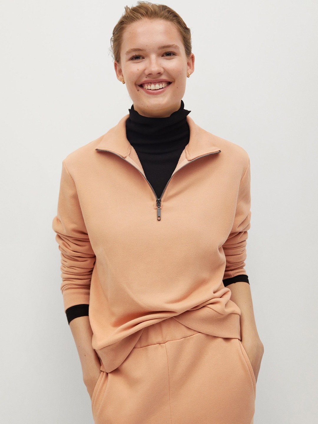 

MANGO Women Peach-Coloured Solid Sweatshirt