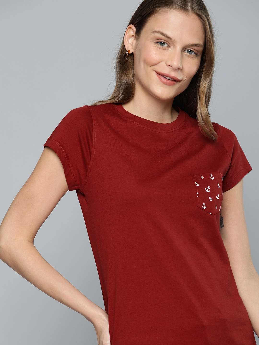 

Mast & Harbour Women Maroon Solid Round Neck T-shirt With Printed Pocket