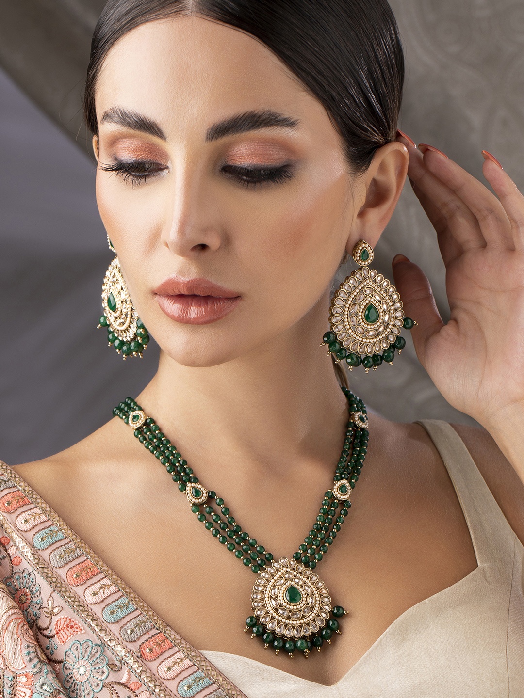 

Rubans Gold-Plated & Green Kundan Studded Handcrafted Kundan Jewellery Set
