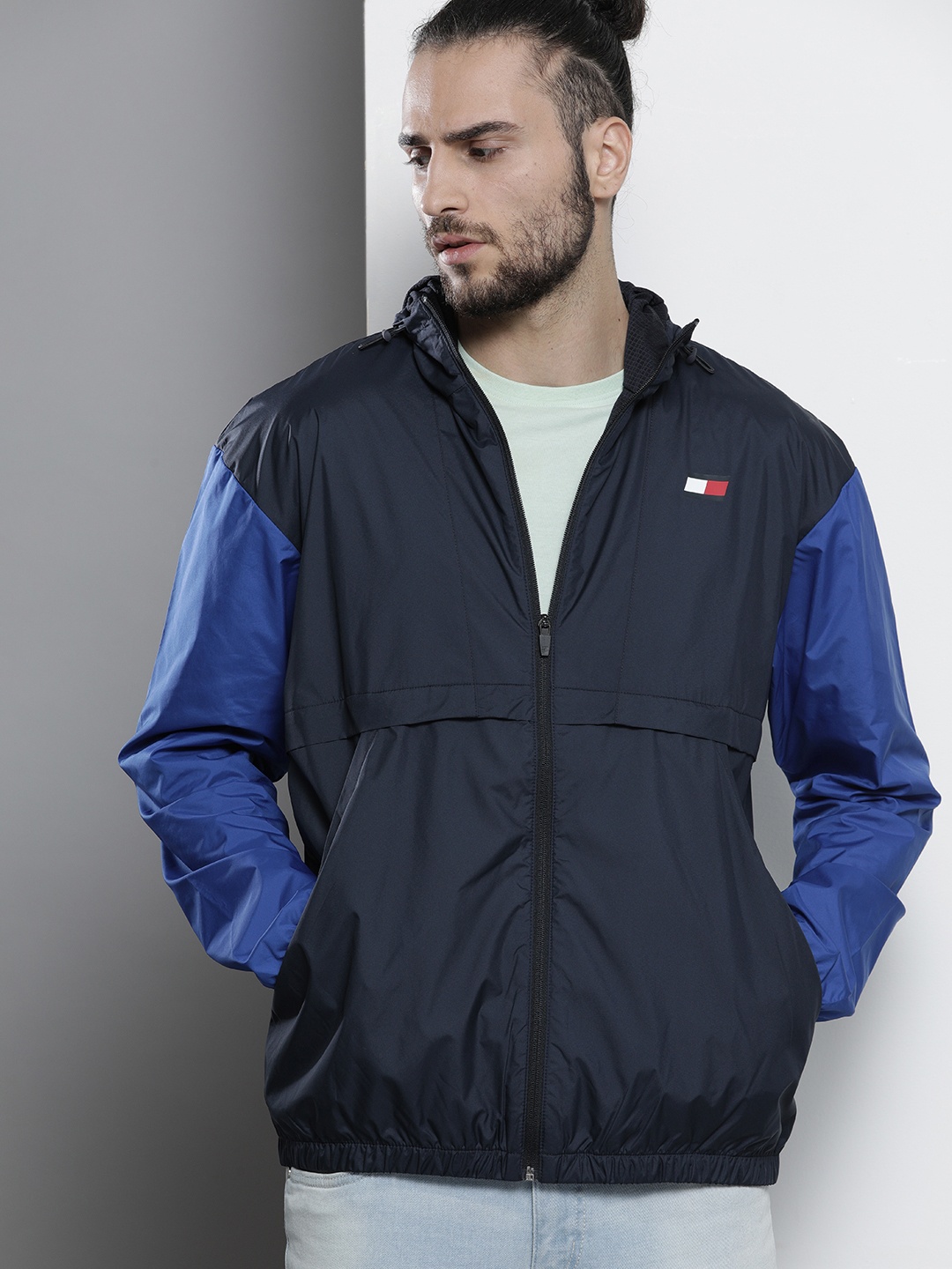 

Tommy Hilfiger Men Navy Blue Windcheater Sporty Jacket