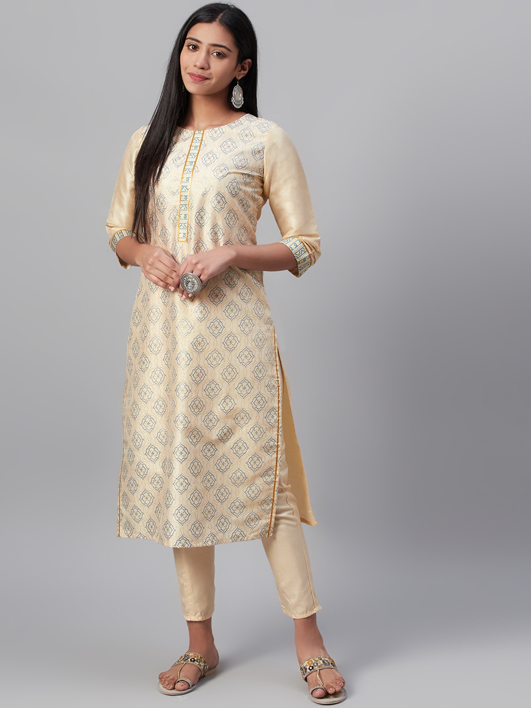 

ZIYAA Women Cream-Coloured & Blue Foil Printed Kurta with Trousers