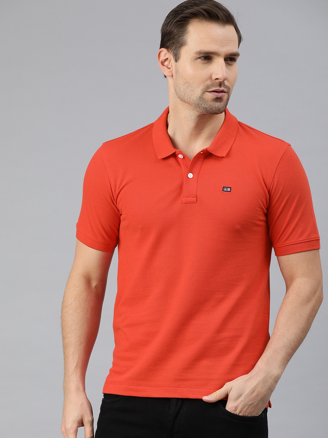 

Arrow Sport Men Orange Solid Polo Collar T-shirt