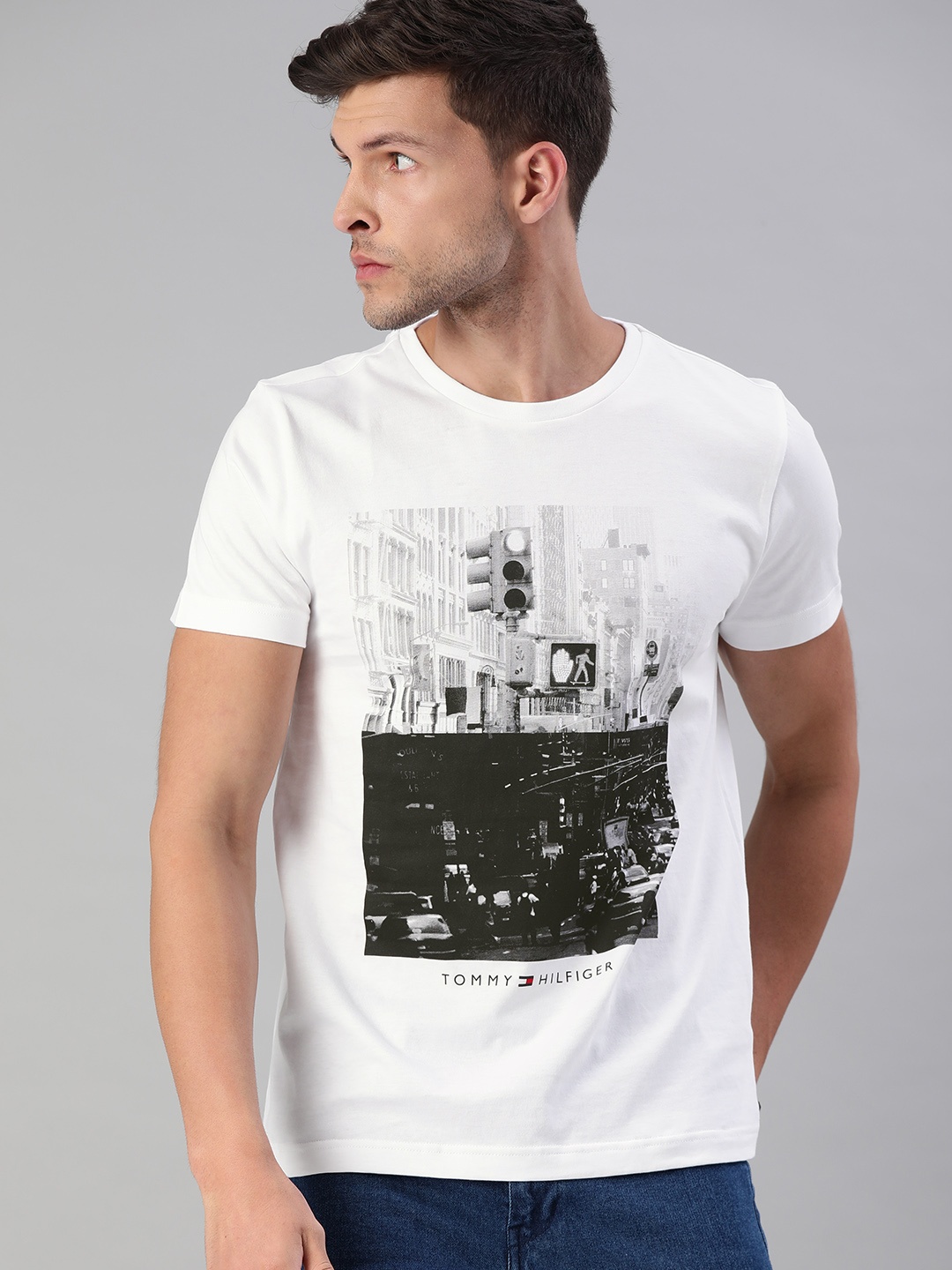 

Tommy Hilfiger Men White Graphic Printed Round Neck Pure Cotton T-shirt