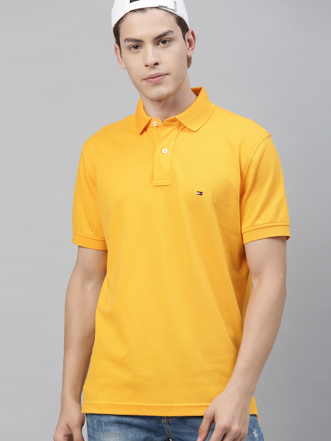 

Tommy Hilfiger Men Yellow Solid Polo Collar T-shirt