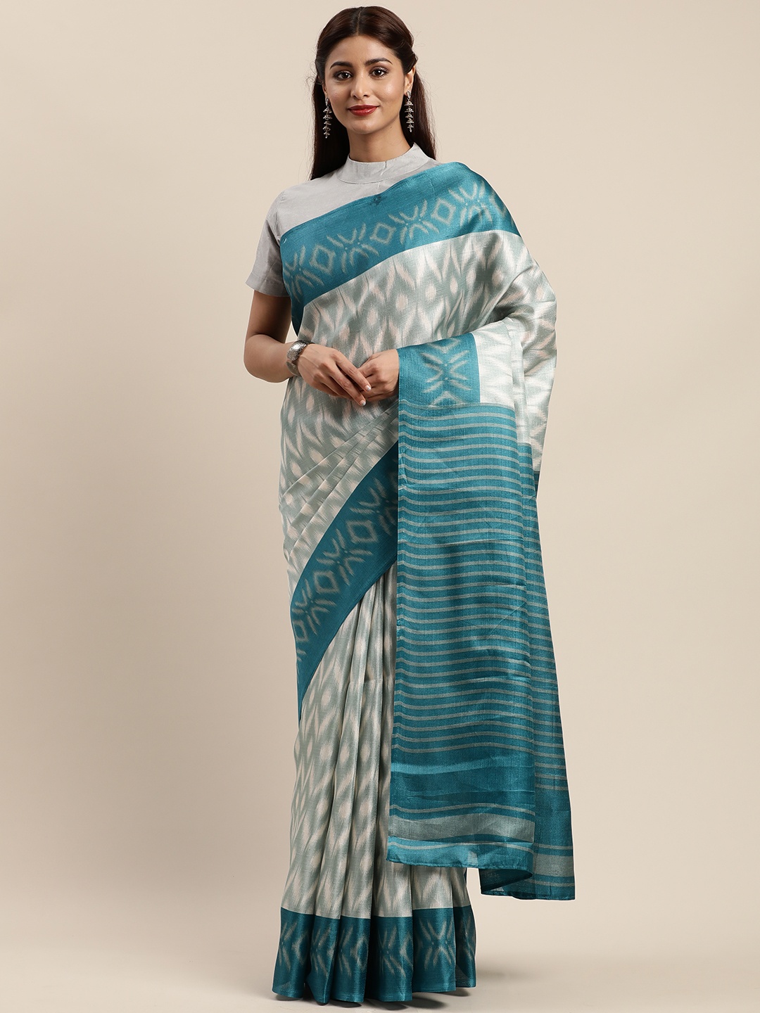 

MIRCHI FASHION Off-White & Teal Blue Art Silk Printed Saree