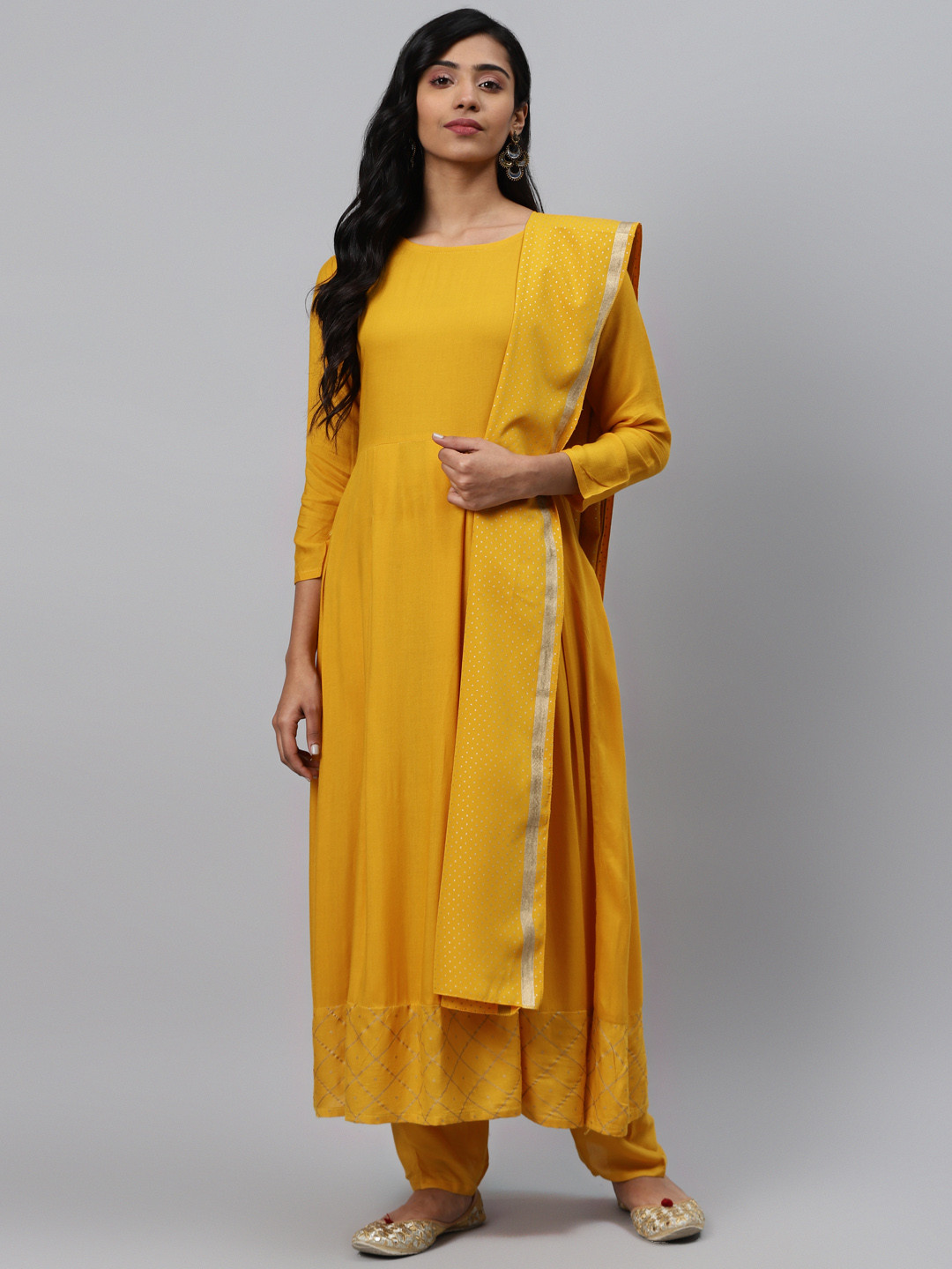 

KALINI Women Mustard Yellow Solid Kurta with Trousers & Dupatta