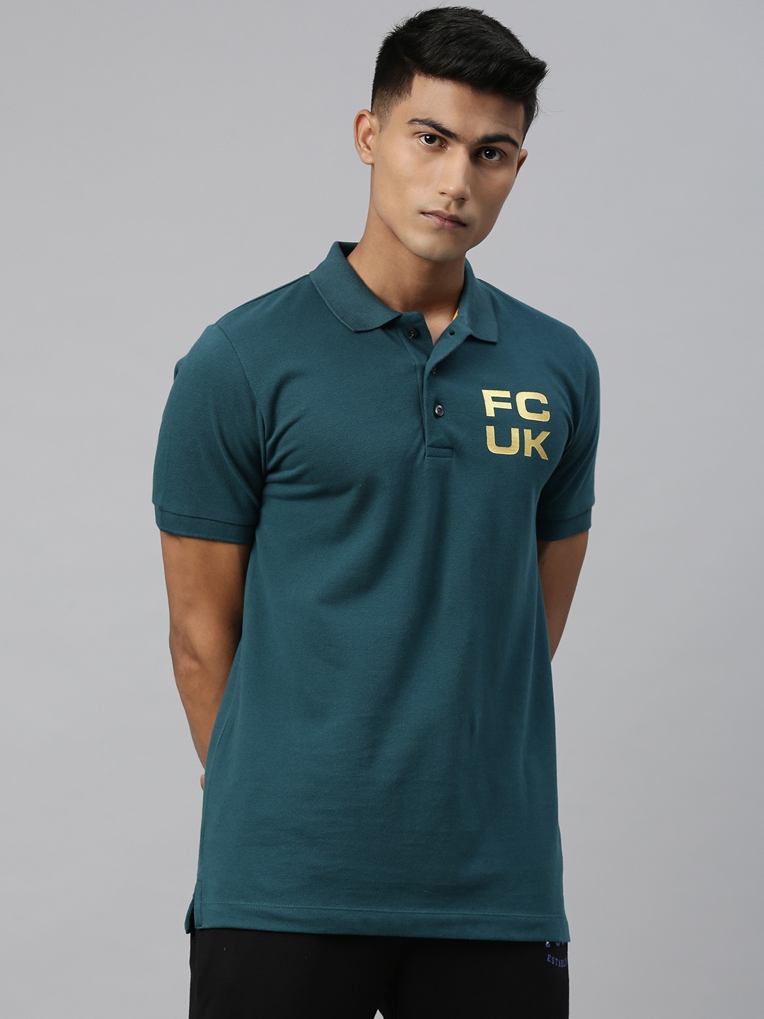 

French Connection Men Teal Green Solid Slim Fit Polo Collar T-shirt With Printed Detailing