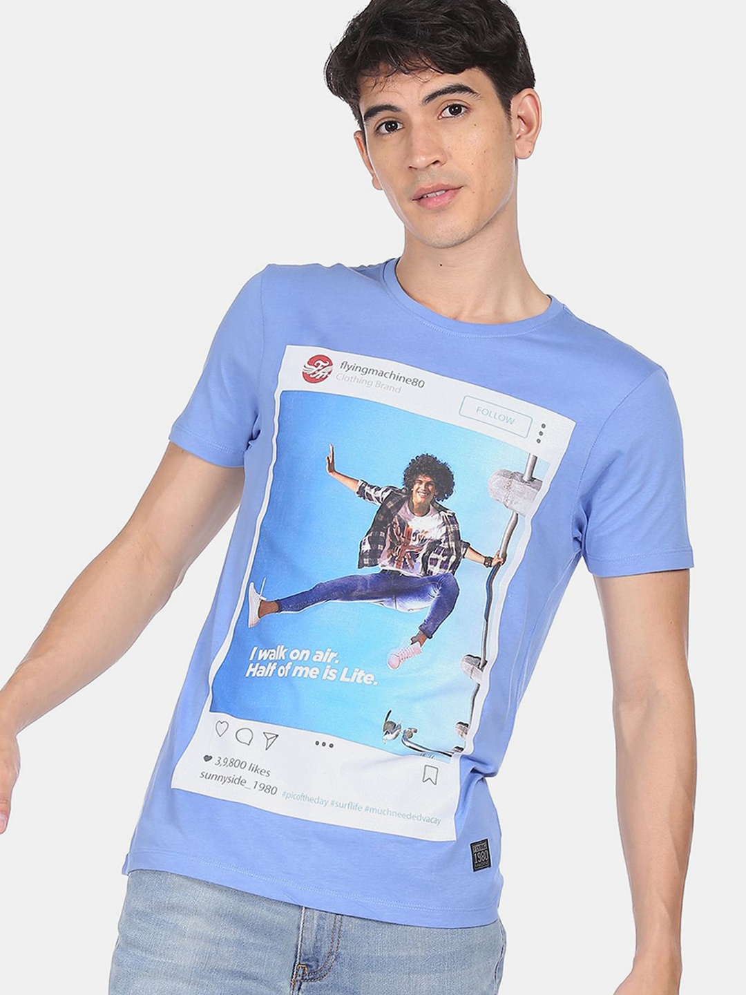 

Flying Machine Men Blue Printed V-Neck Pure Cotton T-shirt