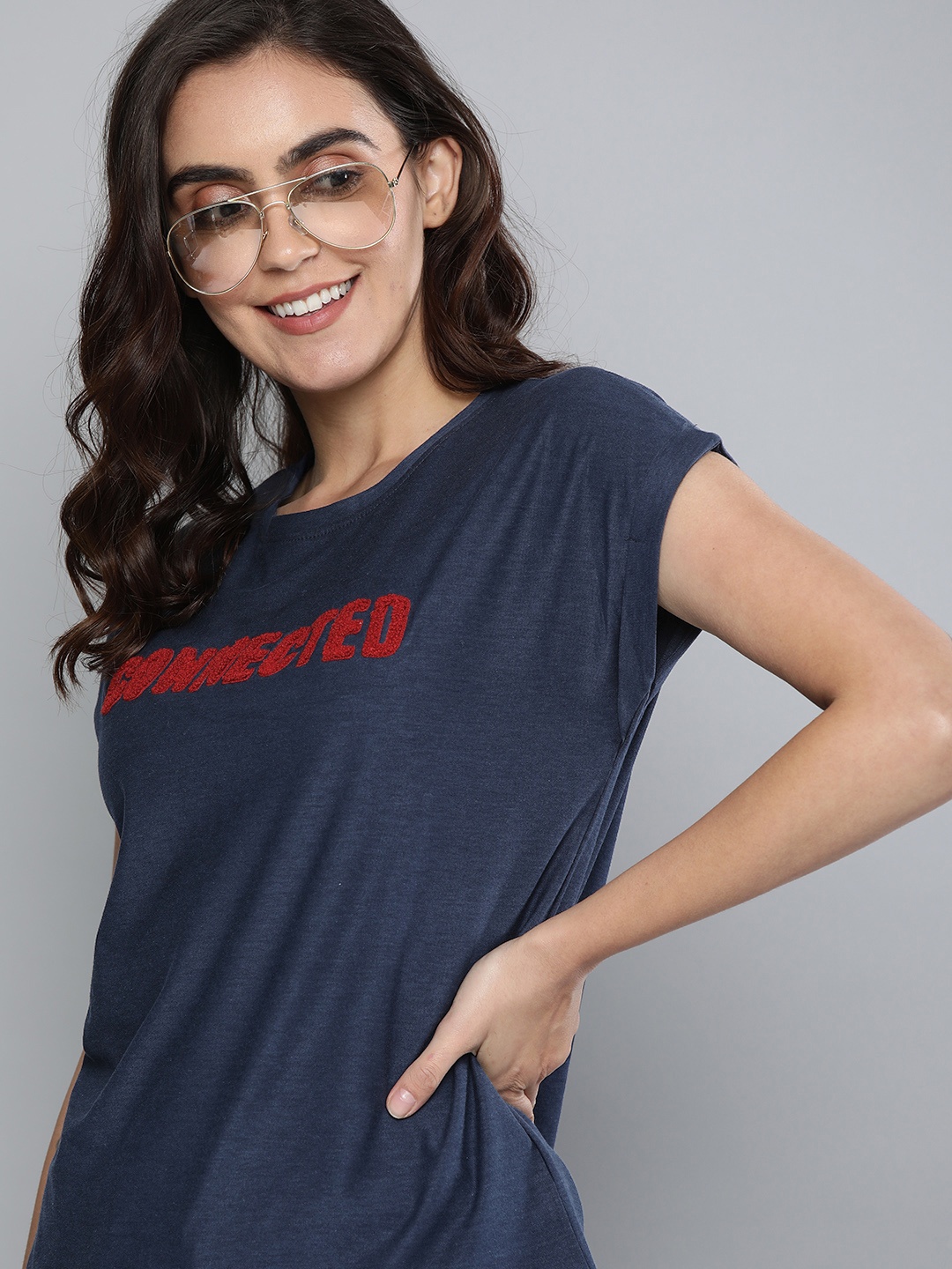 

Mast & Harbour Women Navy Blue Self Design Round Neck T-shirt