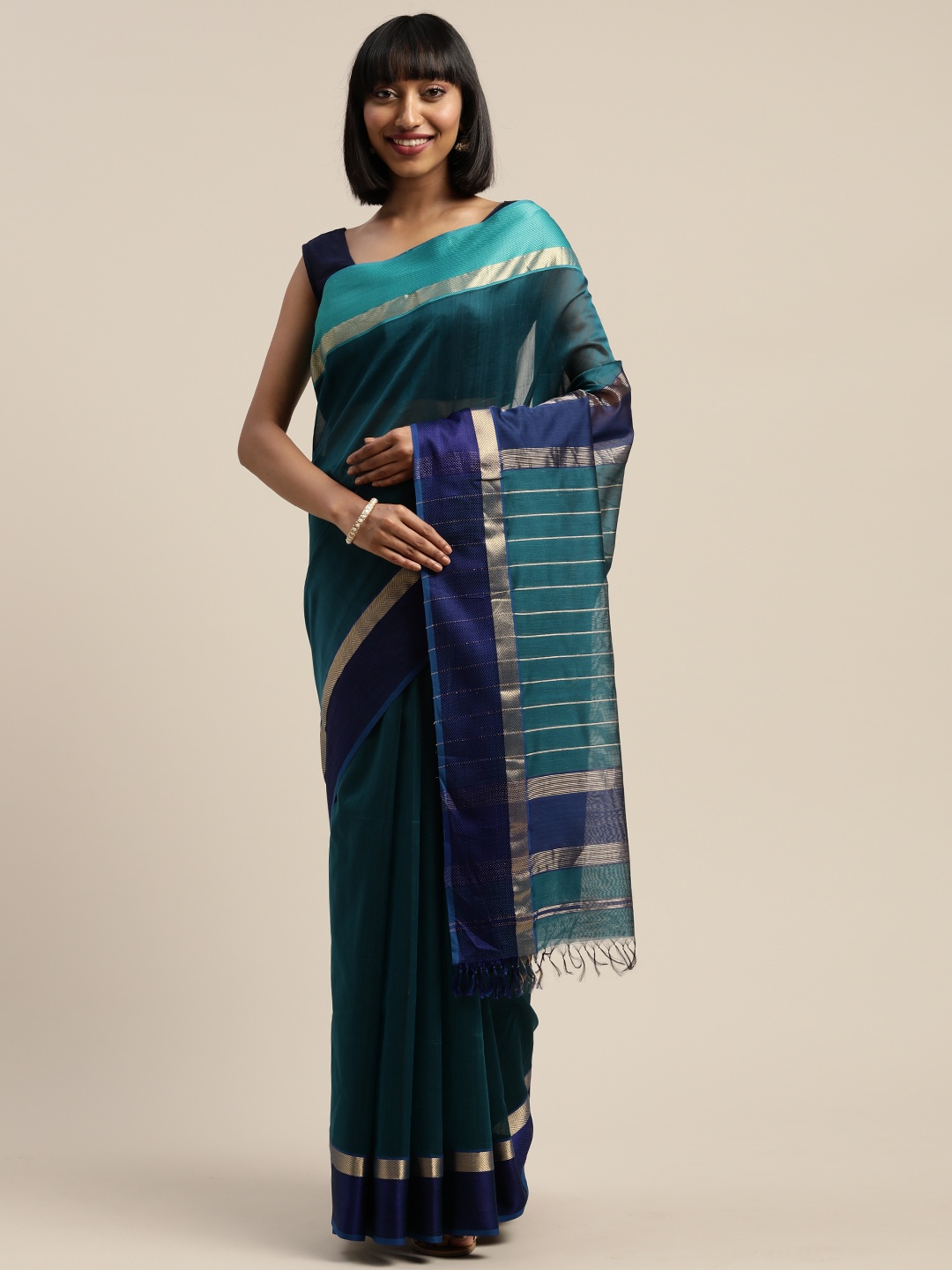 

Mitera Green Liva Silk Cotton Solid Maheshwari Saree