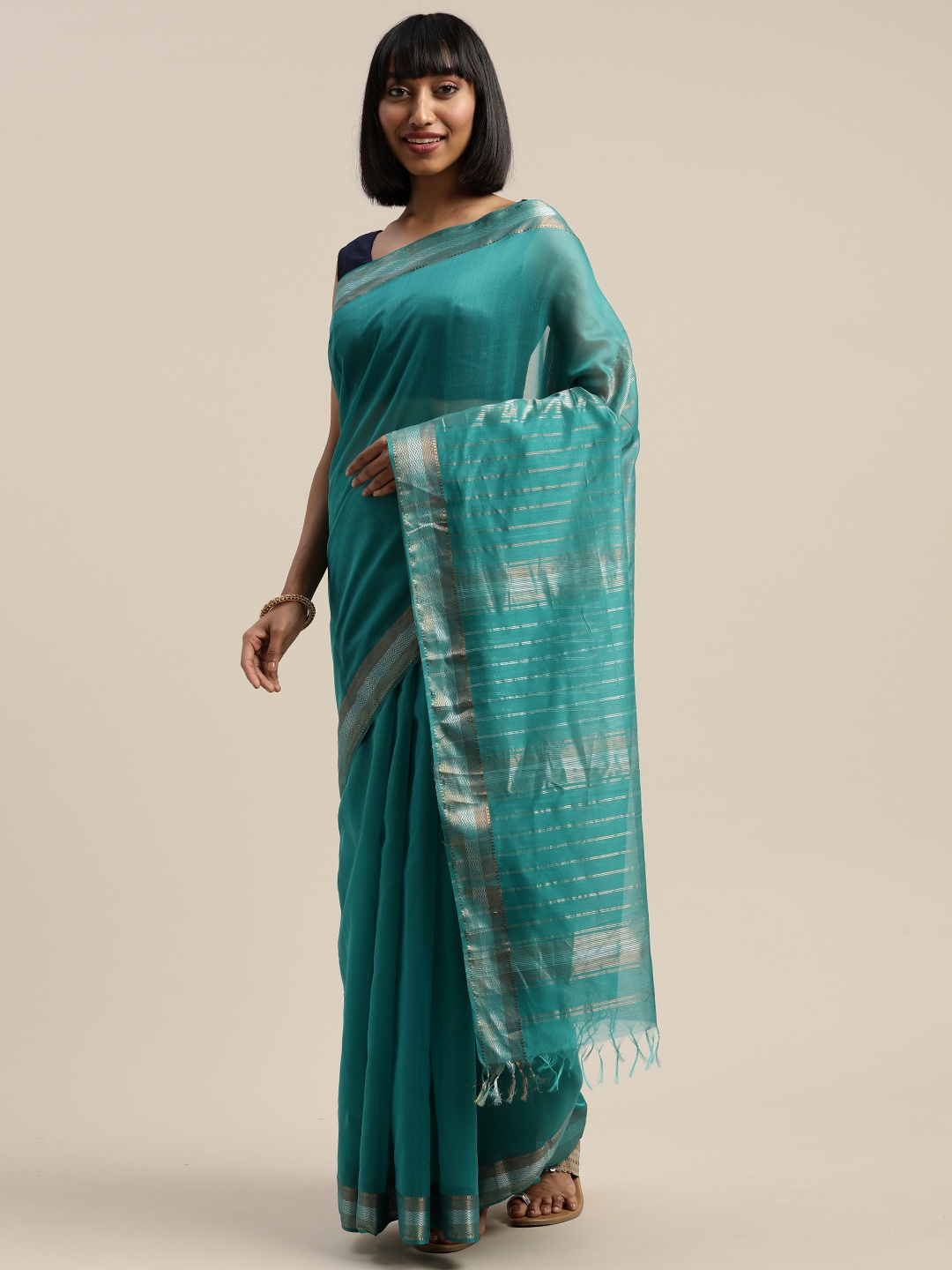 

Mitera Green & Silver-Toned Liva Silk Cotton Solid Maheshwari Handloom Saree