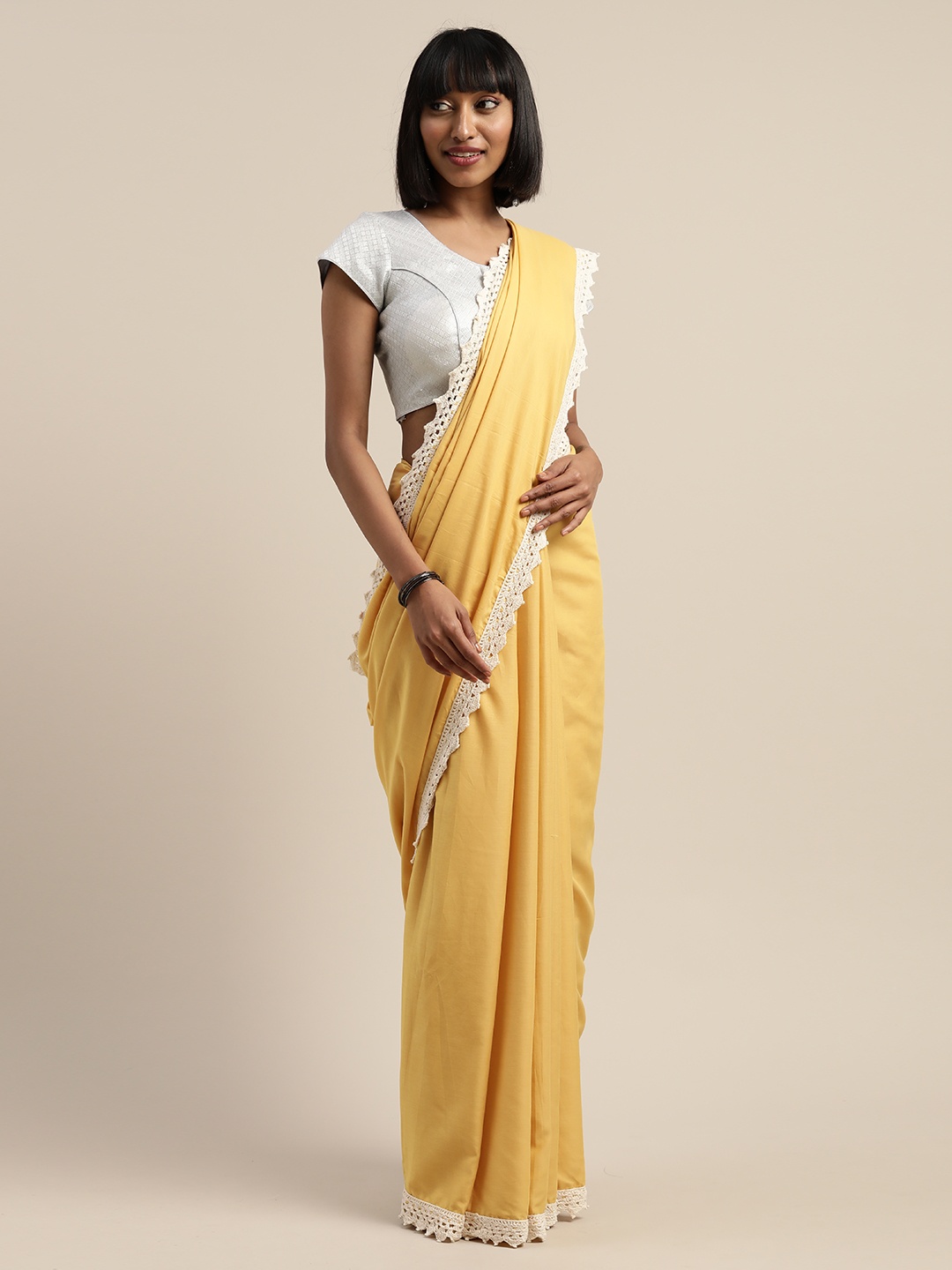 

Mitera Yellow & White Liva Solid Saree