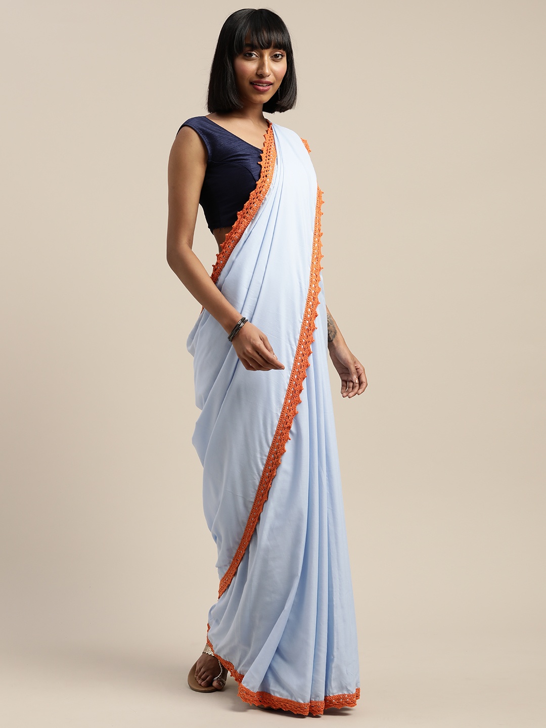 

Mitera Powder Blue Solid Liva Saree