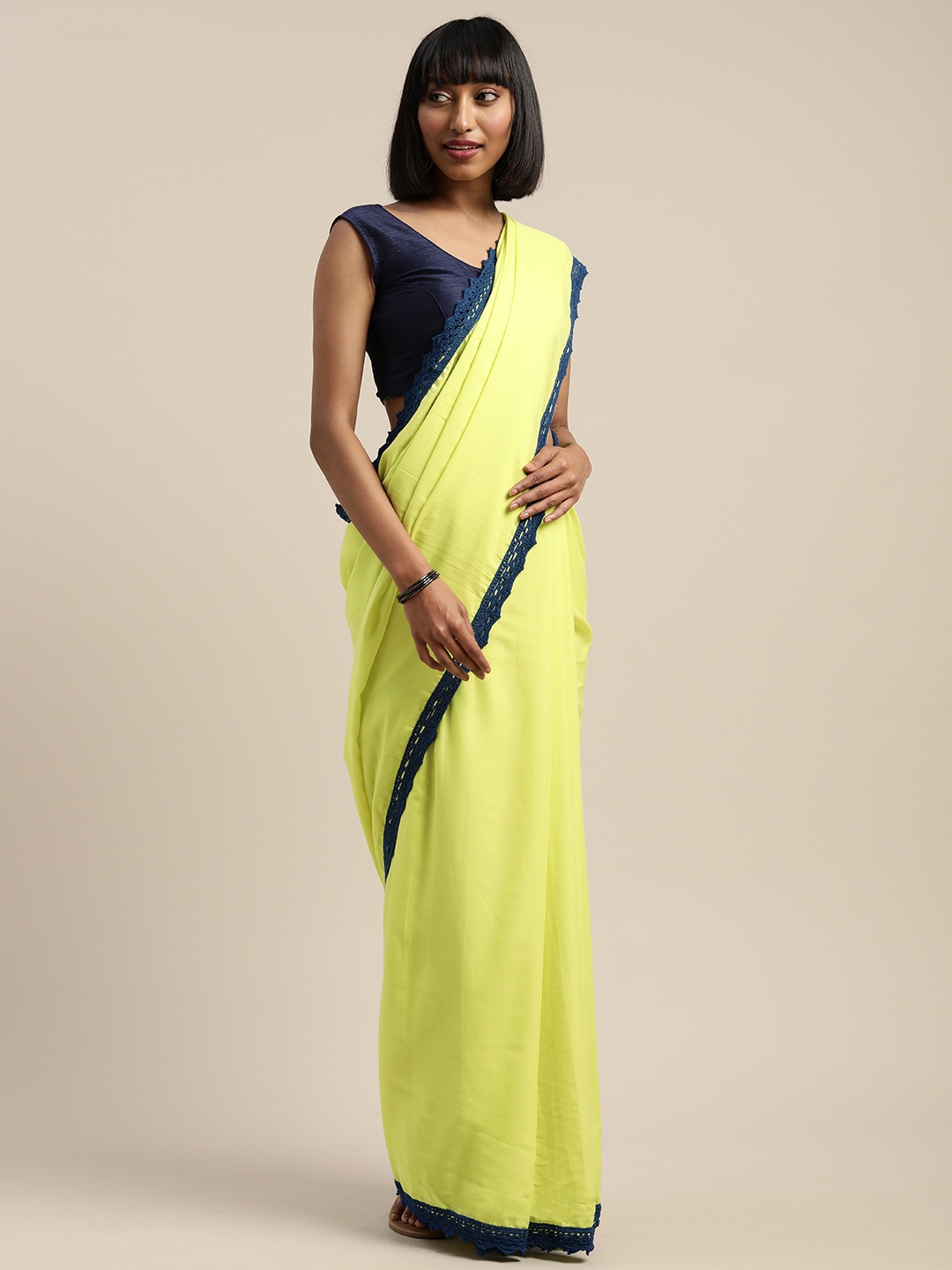 

Mitera Lime Yellow Solid Liva Saree, Lime green