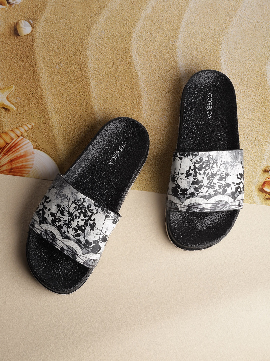 

CORSICA Women Beige & Black Abstract Printed Slider Flip Flops