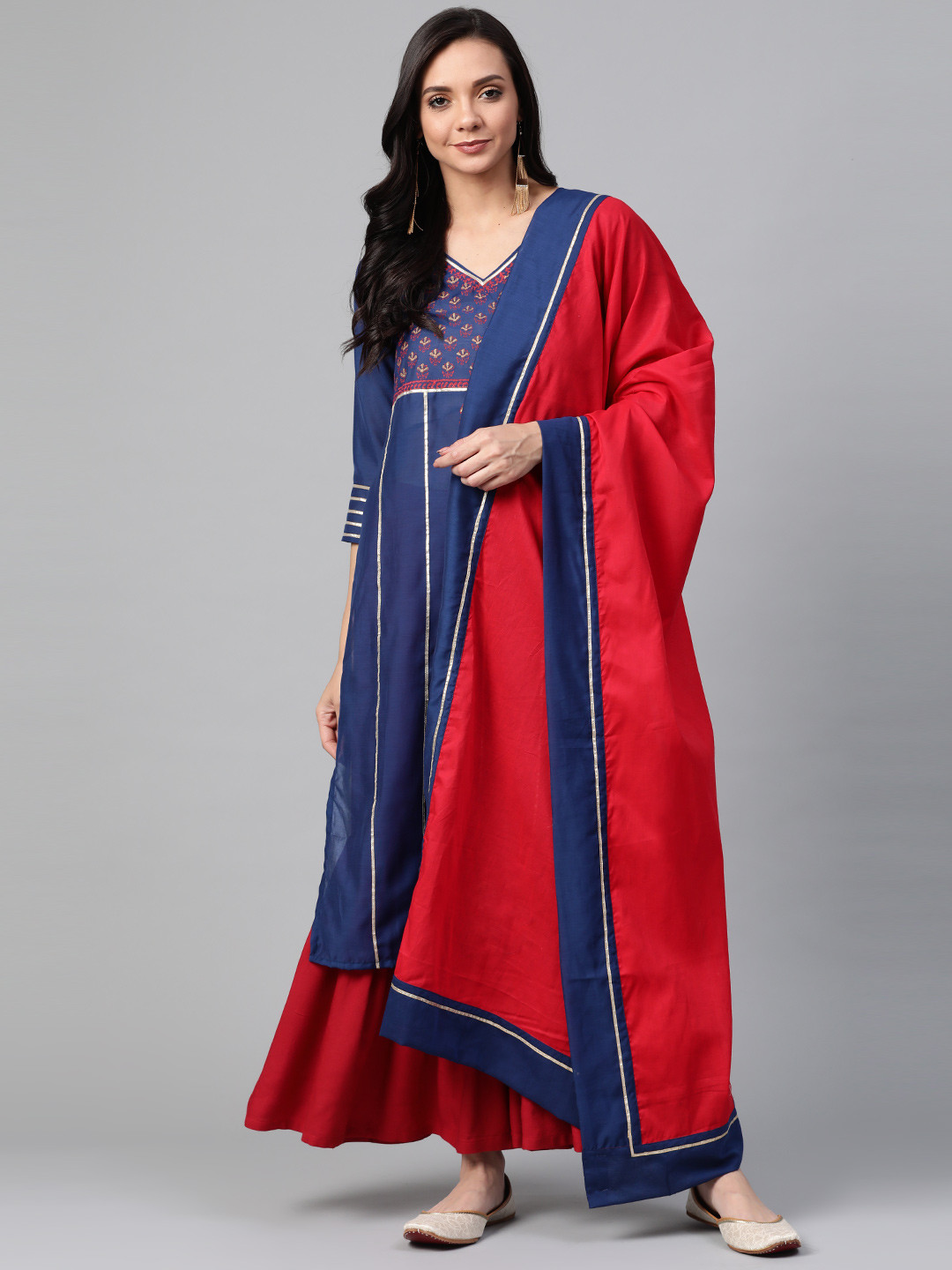 

PINKSKY Women Navy Blue & Red Striped Sustainable Kurta with Sharara & Dupatta