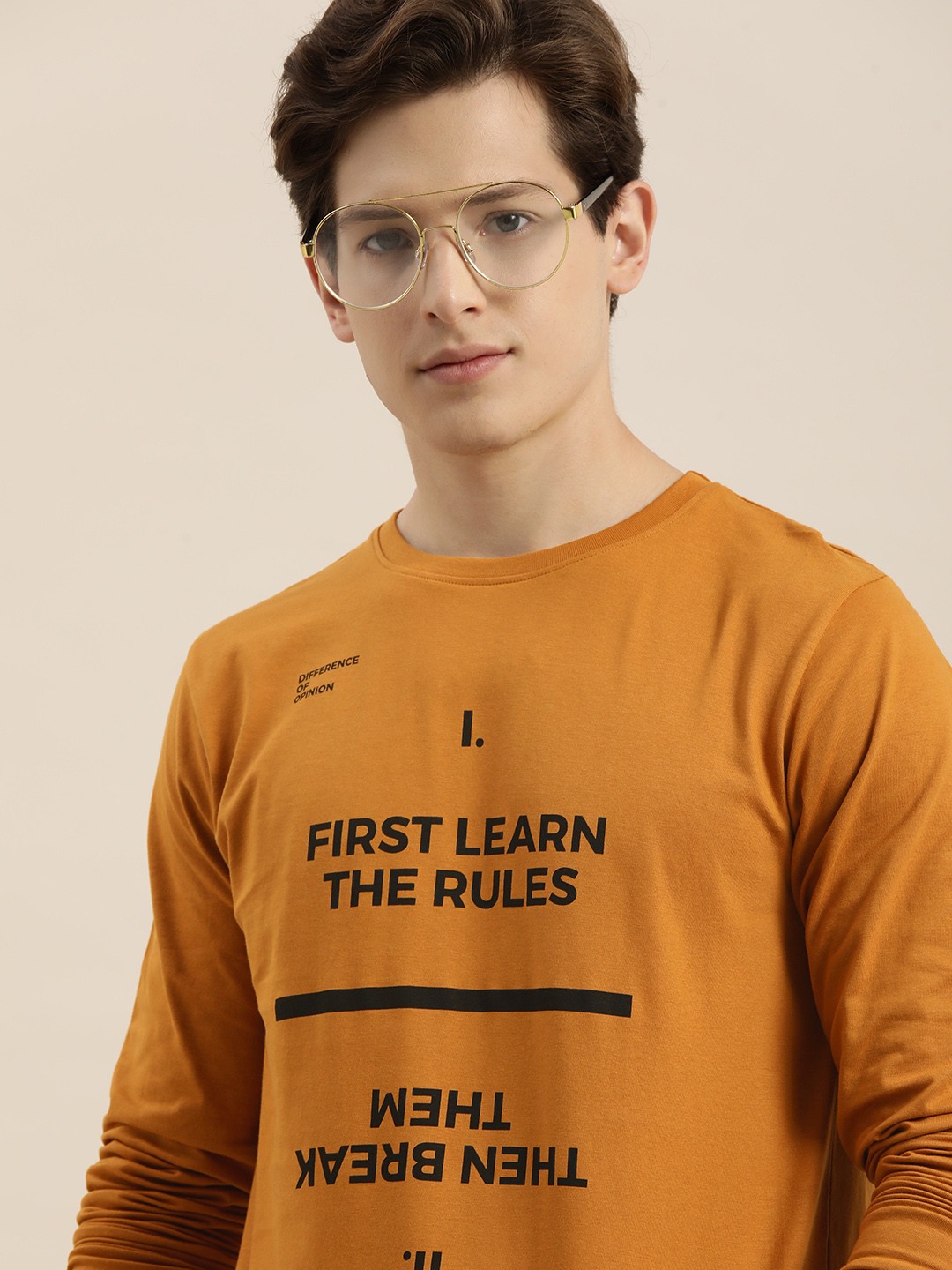 

Difference of Opinion Men Mustard Yellow Typography Printed Pure Cotton T-shirt