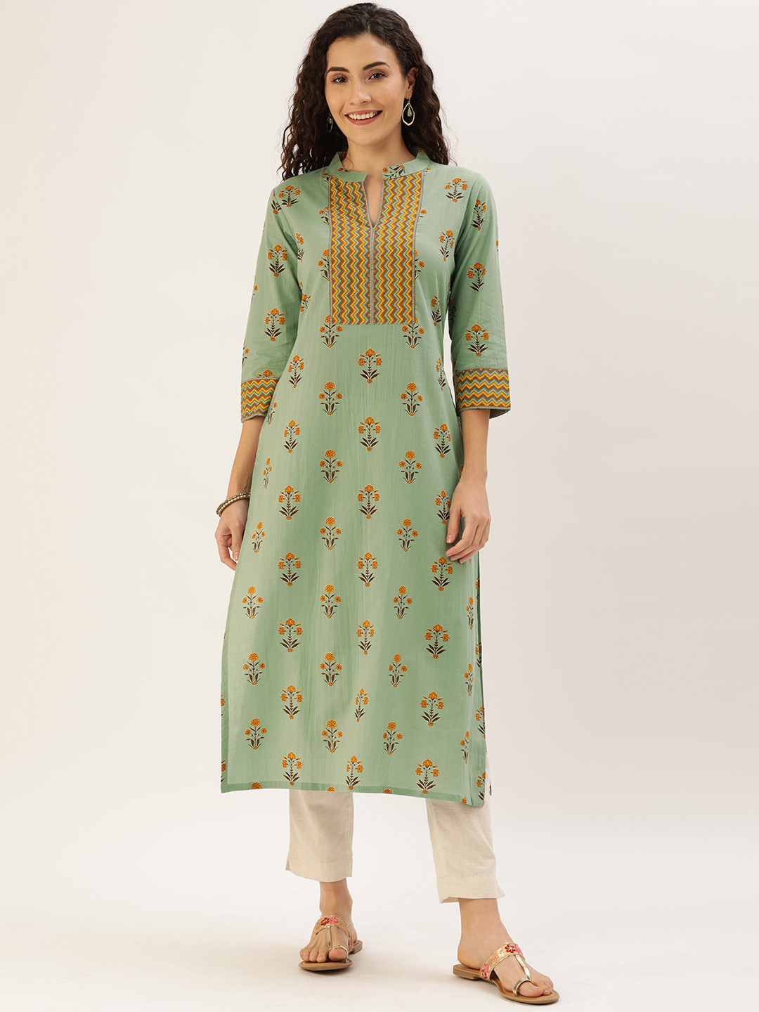 

Rajnandini Women Sea Green & Mustard Yellow Floral Printed Straight Kurta
