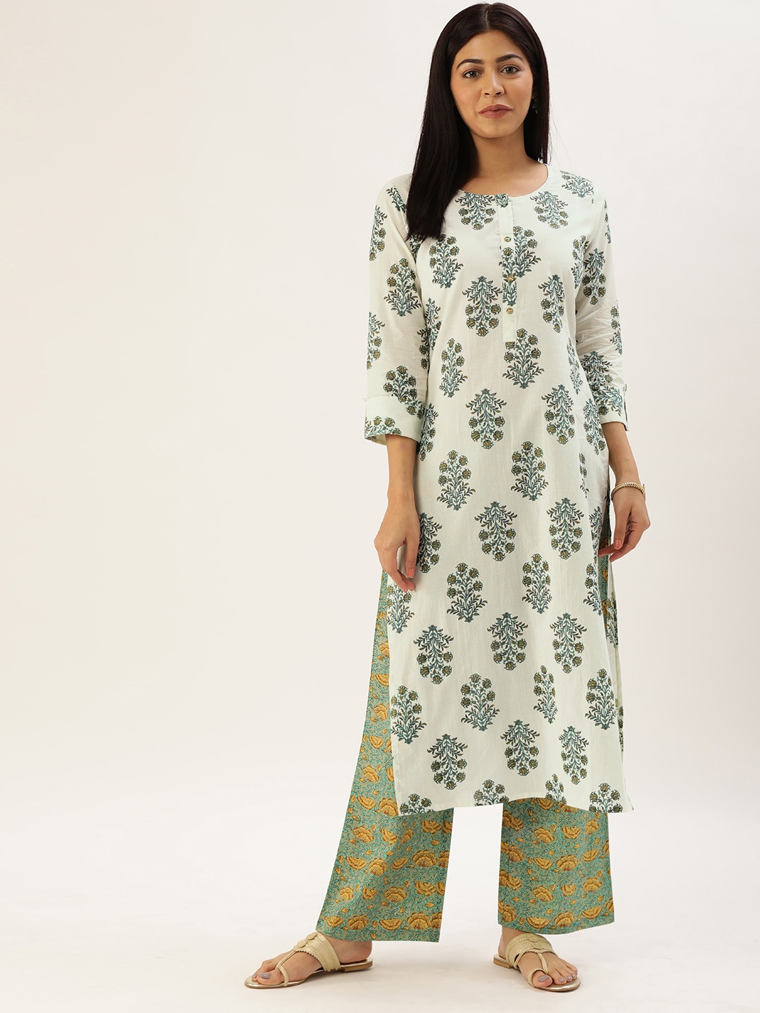 

Rajnandini Women White & Green Floral Printed Kurta with Palazzos