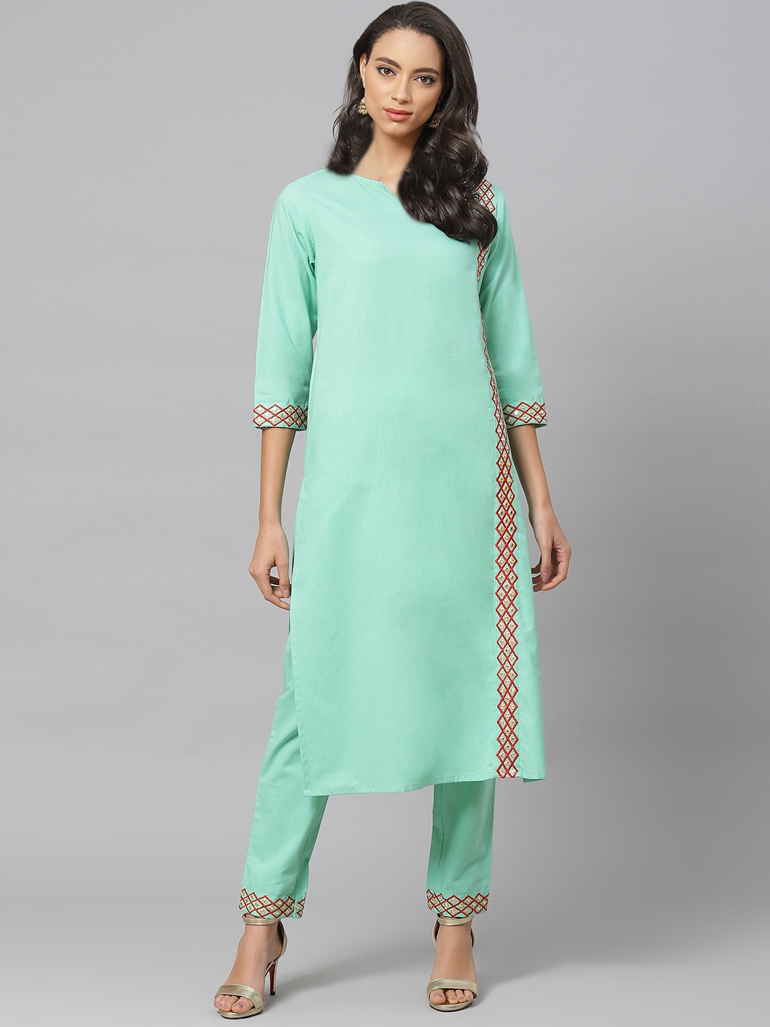 

YASH GALLERY Women Green Solid Kurta with Trousers