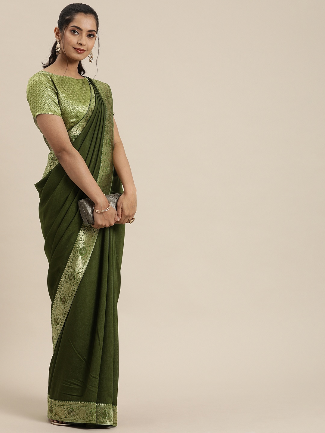 

Inddus Olive Green Silk Blend Solid Saree