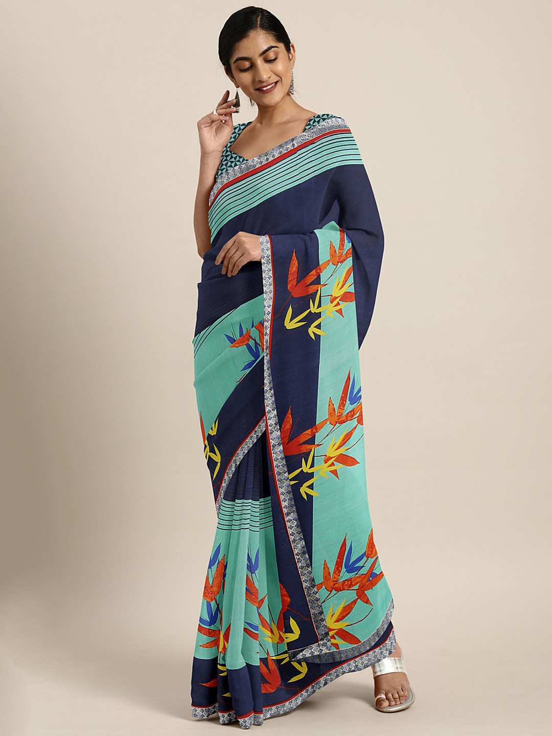 

Mitera Blue Printed Poly Georgette Saree