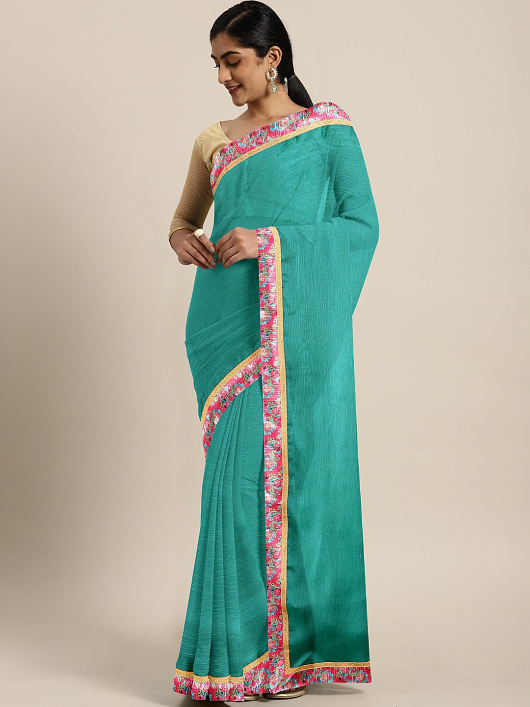 

KALINI Sea Green Solid Poly Chiffon Saree