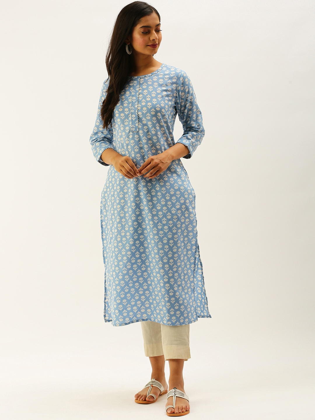 

Rajnandini Women Blue & White Floral Printed Zari Straight Kurta