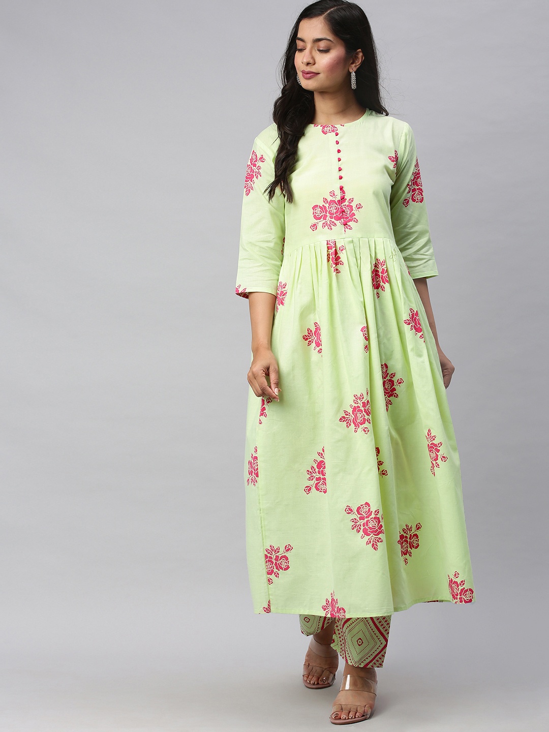 

GoSriKi Women Green & Pink Floral Printed Kurta with Trousers