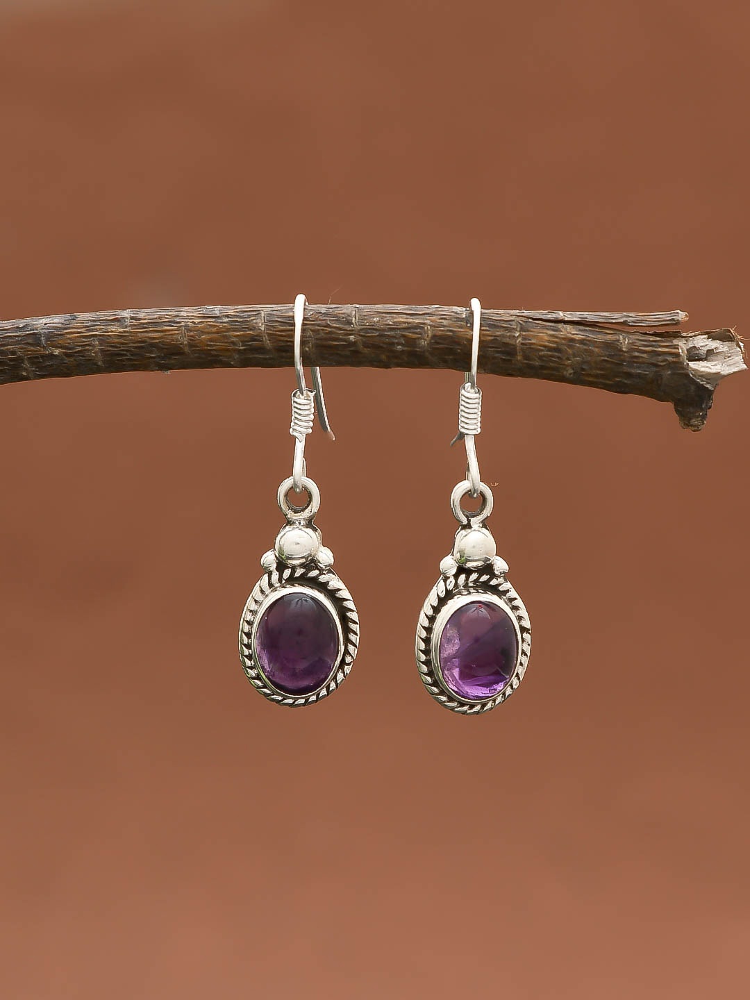 

Silvermerc Designs Silver-Toned & Purple Teardrop Shaped Drop Earrings