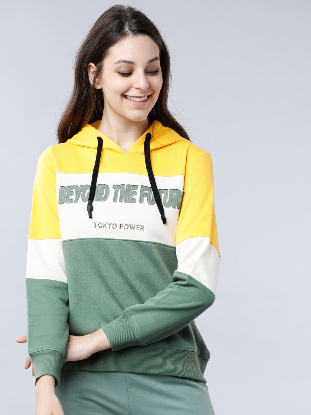 

Tokyo Talkies Women Yellow & Green Colourblocked Hooded Sweatshirt