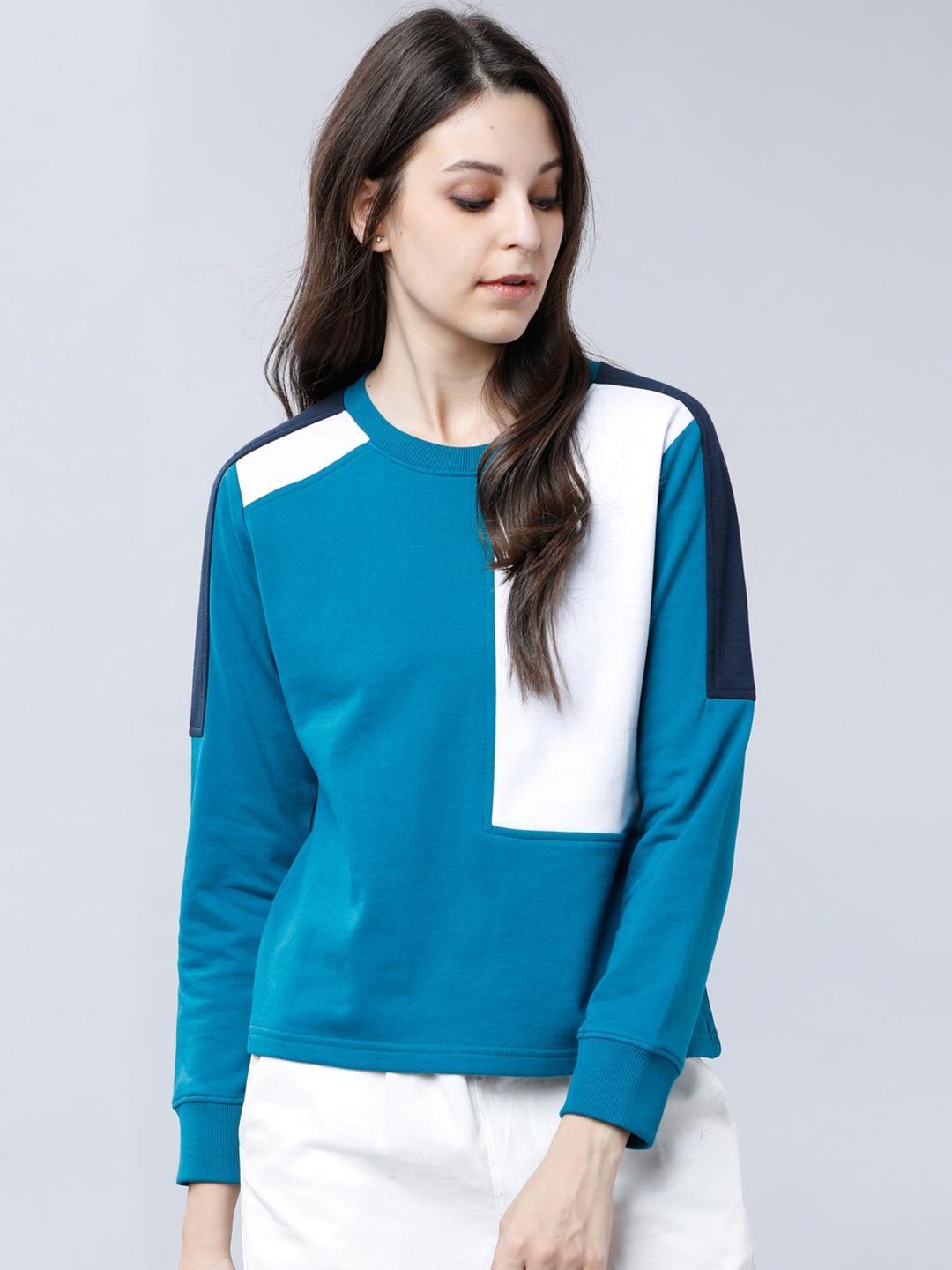 

Tokyo Talkies Women Teal Blue & White Colourblocked Sweatshirt