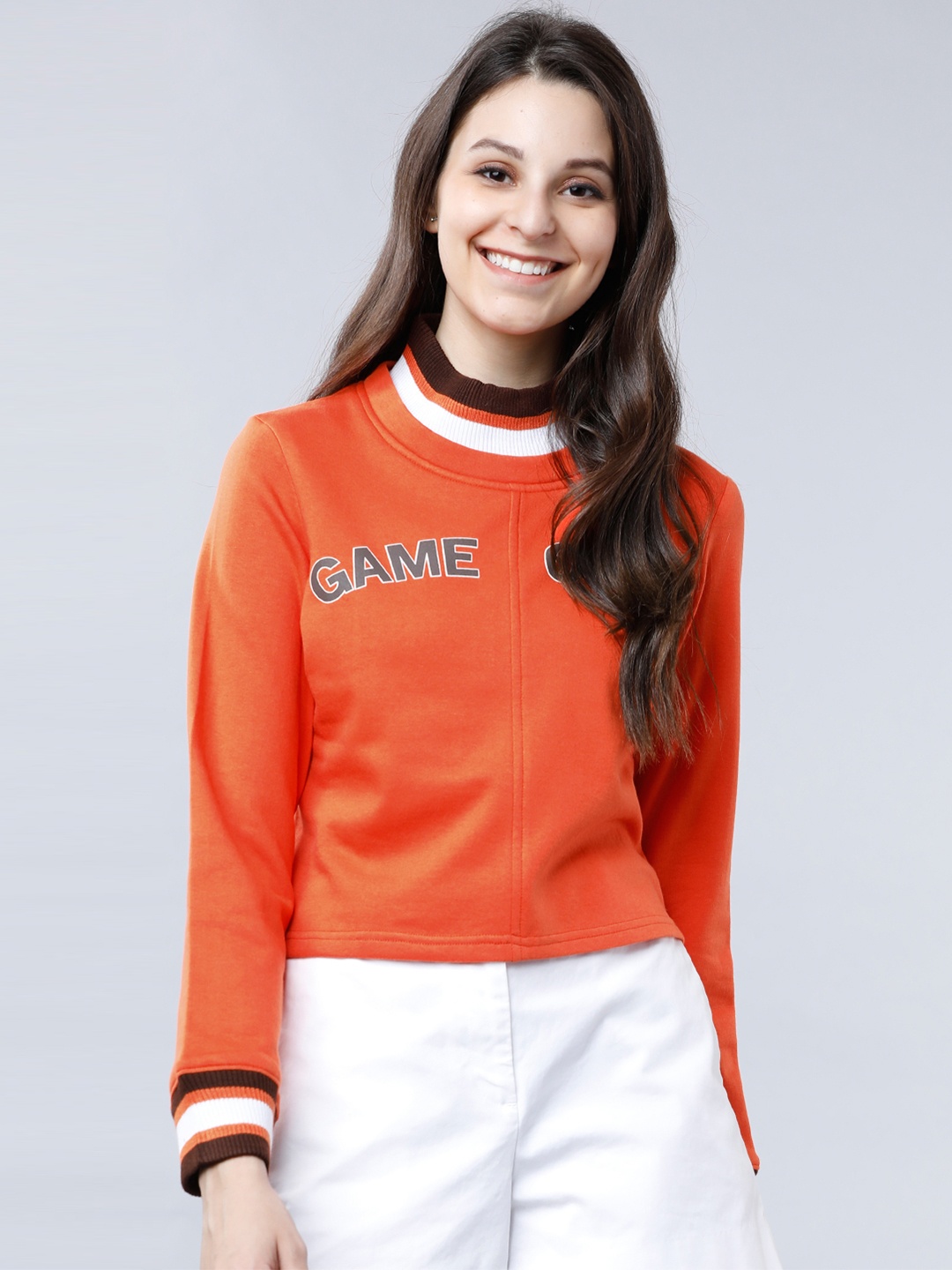 

Tokyo Talkies Women Orange Printed Crop Sweatshirt