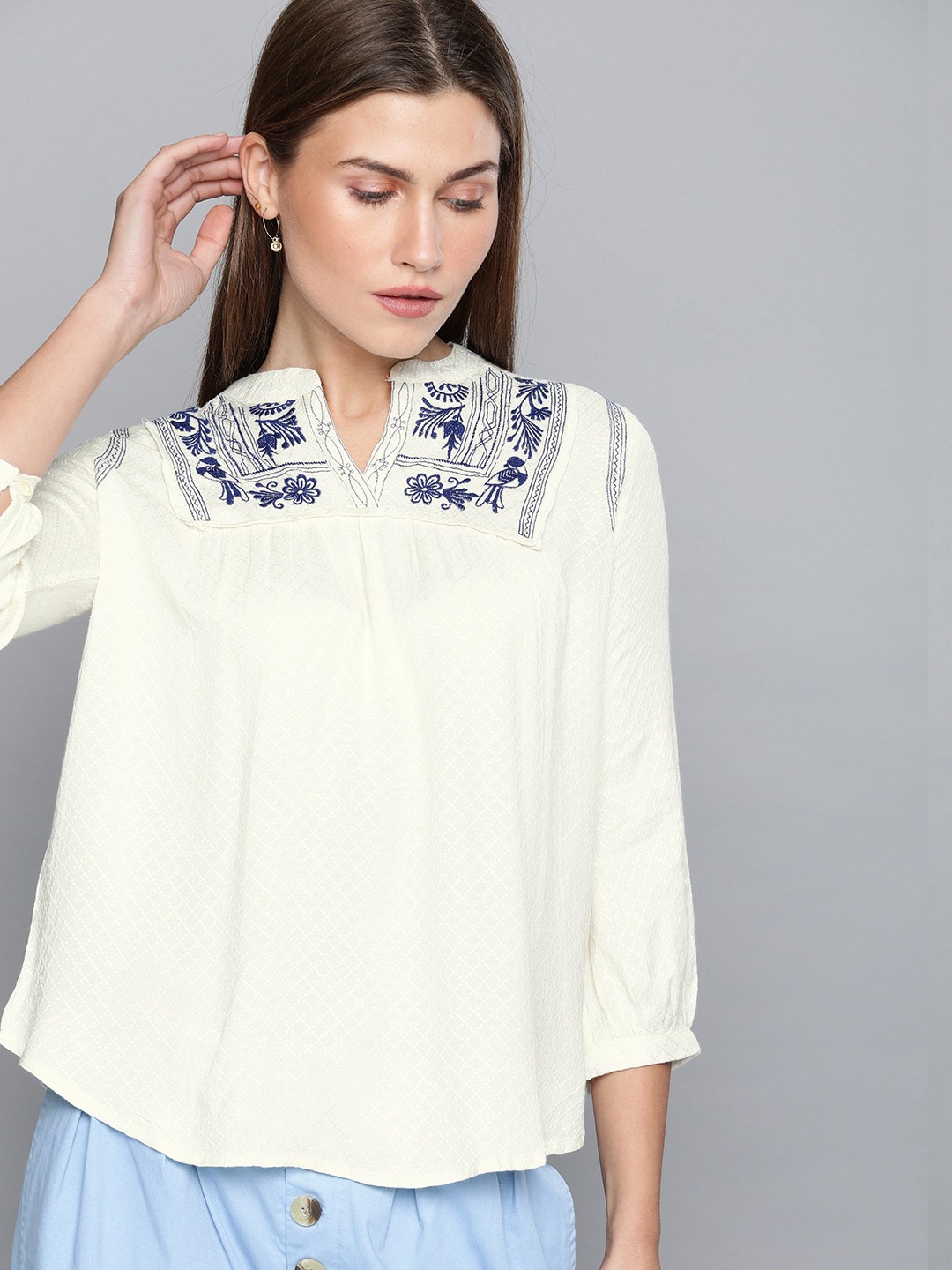 

Chemistry Women White & Navy Blue Self Design Top with Embroidery