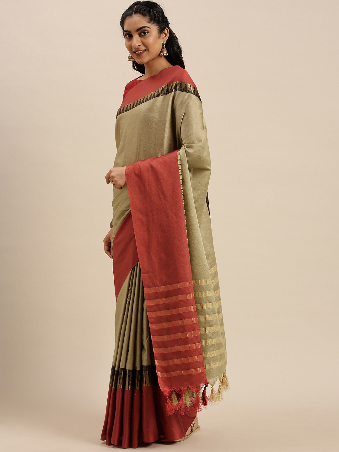 

Mitera Beige Solid Saree