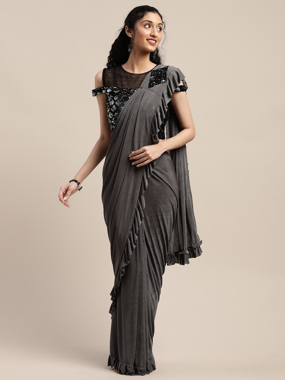 

Neerus Grey Solid Viscose Rayon Saree
