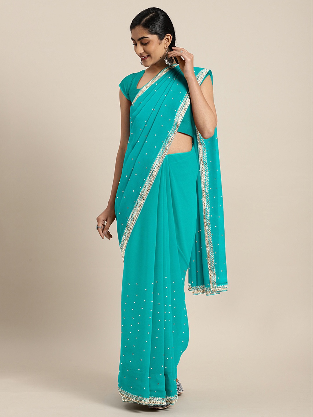 

Neerus Blue Embellished Pure Georgette Saree