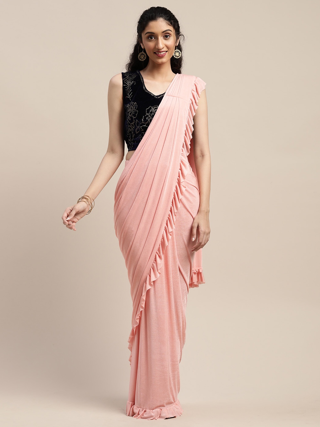 

Neerus Peach-Coloured Solid Viscose Rayon Saree