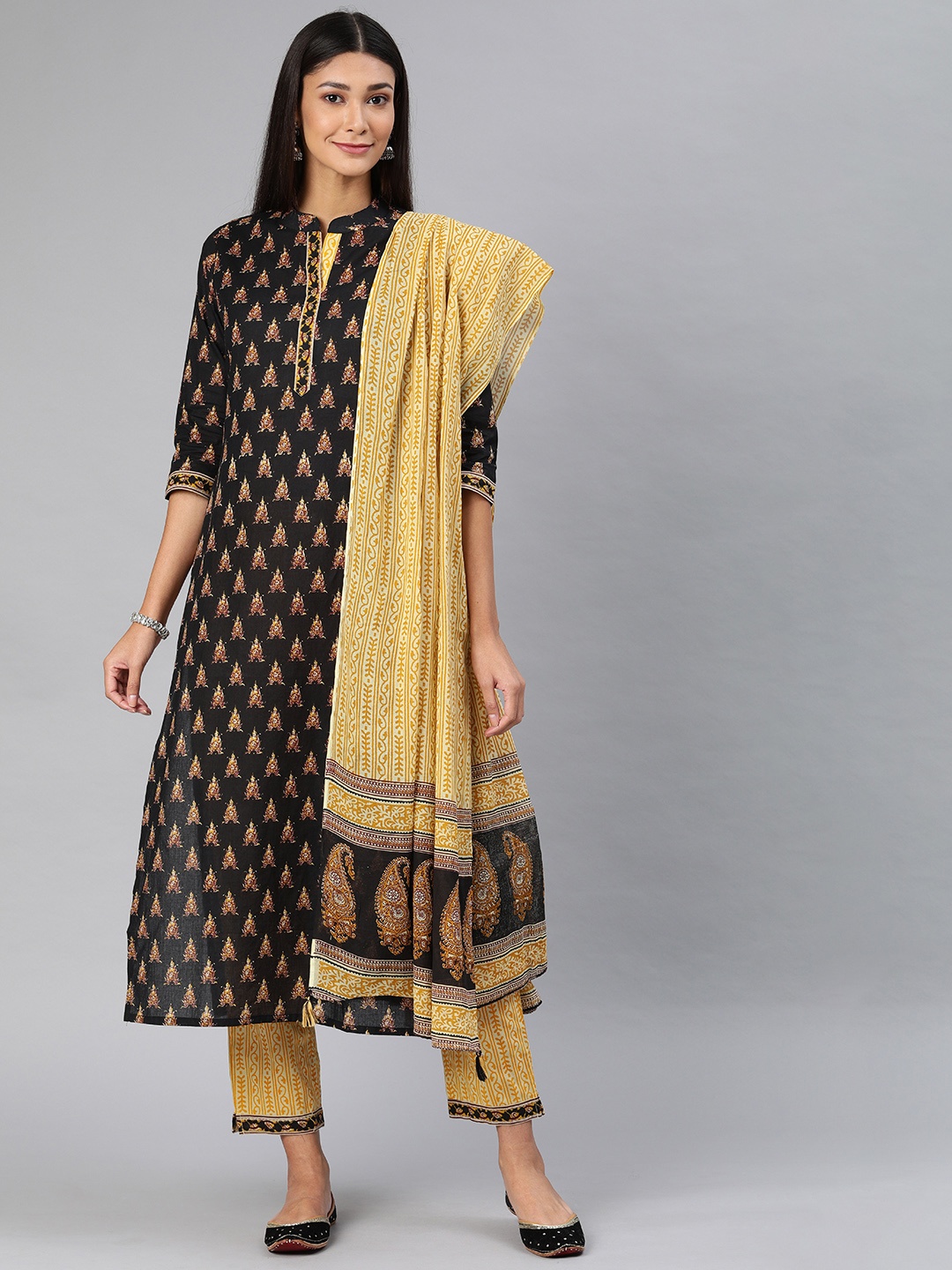 

AHIKA Women Black & Yellow Printed Kurta with Trousers & Dupatta