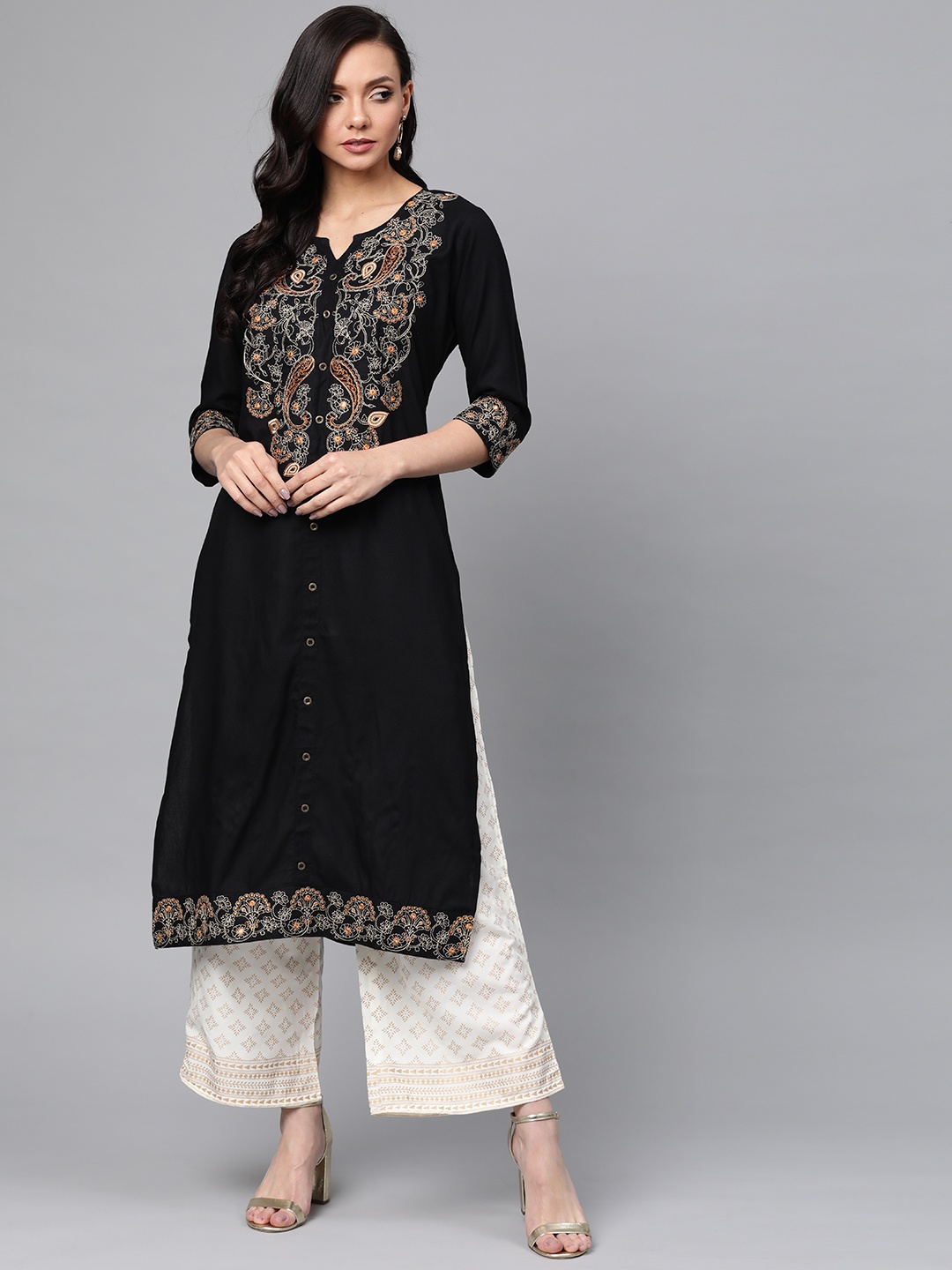 

Ishin Women Black & Off-White Embroidered Kurta with Palazzos