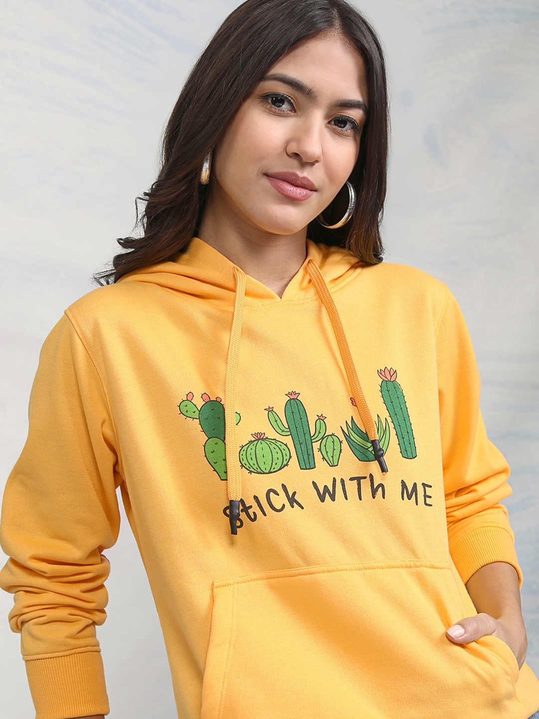 

Tokyo Talkies Women Yellow & Green Printed Hooded Sweatshirt
